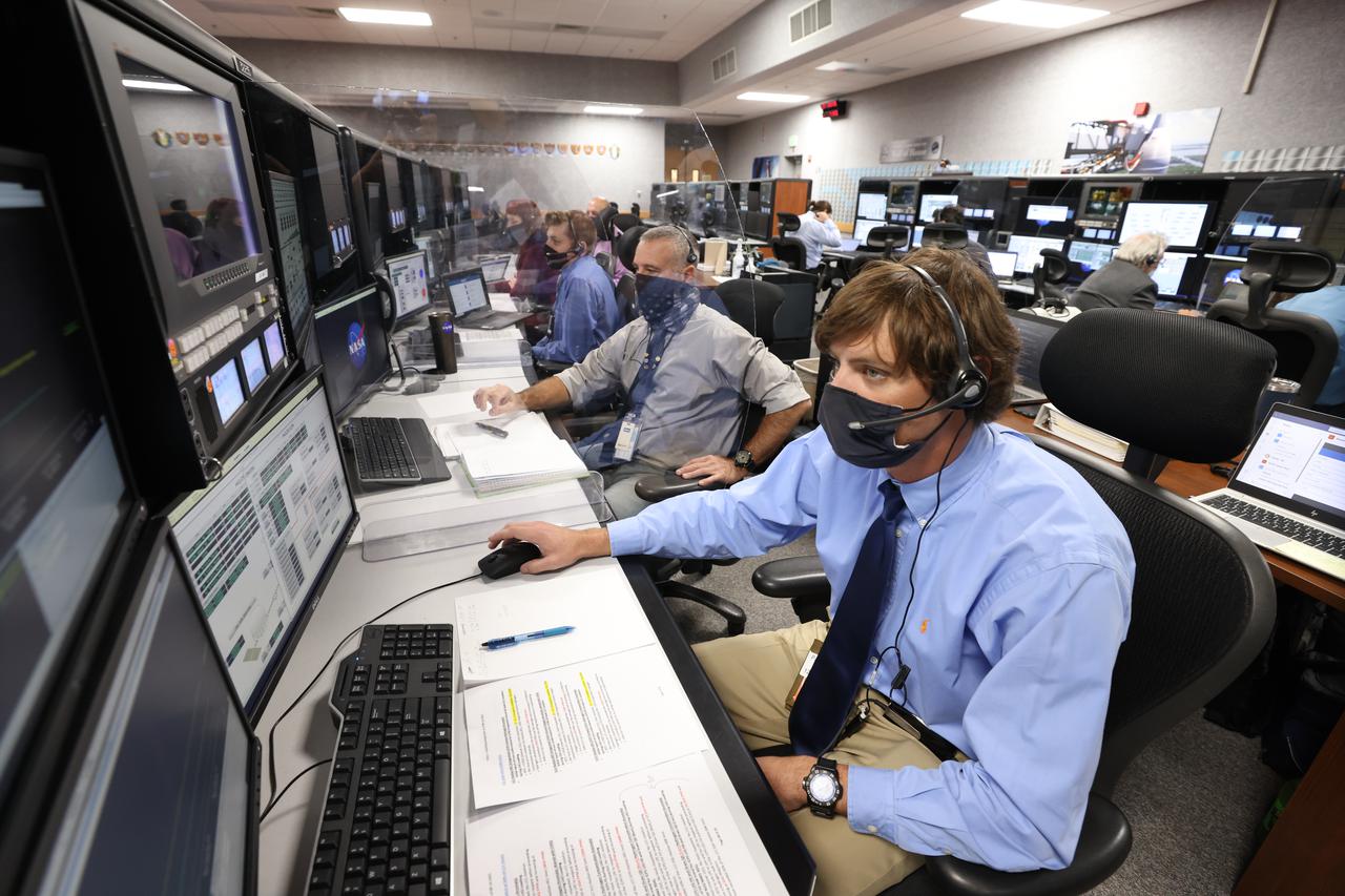 Launch team members are seated at the Hazardous Gas consoles inside Firing Room 1 of the Launch Control Center at NASA’s Kennedy Space Center in Florida on Dec. 13, 2021. They are participating in a joint integrated simulation for the Artemis I launch that covered both cryogenic loading and terminal countdown portions of prelaunch activities. Members of NASA’s mission management team and launch team conducted the simulation together. The Kennedy team was certified for the Artemis I launch. During Artemis I, the agency’s Orion spacecraft will lift off from Kennedy aboard NASA’s most powerful rocket – the Space Launch System – to fly farther than any spacecraft built for humans has ever flown. Through NASA’s Artemis missions, the agency, along with commercial and international partners, will establish a sustainable human presence on the Moon to prepare for missions to Mars.