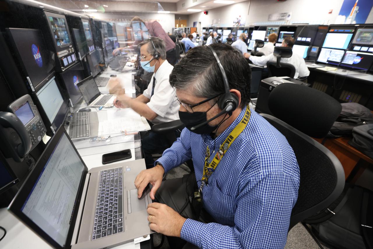 Launch team members are seated at the Biomedical/Emergency Medical Services consoles inside Firing Room 1 of the Launch Control Center at NASA’s Kennedy Space Center in Florida on Dec. 13, 2021. They are participating in a joint integrated simulation for the Artemis I launch that covered both cryogenic loading and terminal countdown portions of prelaunch activities. Members of NASA’s mission management team and launch team conducted the simulation together. The Kennedy team was certified for the Artemis I launch. During Artemis I, the agency’s Orion spacecraft will lift off from Kennedy aboard NASA’s most powerful rocket – the Space Launch System – to fly farther than any spacecraft built for humans has ever flown. Through NASA’s Artemis missions, the agency, along with commercial and international partners, will establish a sustainable human presence on the Moon to prepare for missions to Mars.