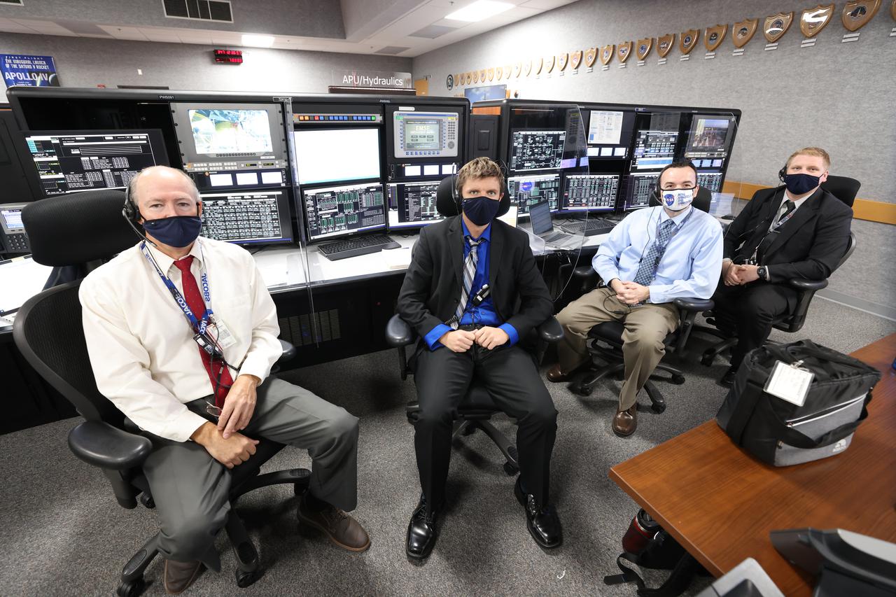 Launch team members are seated at the Auxiliar Power Units/Hydraulics consoles inside Firing Room 1 of the Launch Control Center at NASA’s Kennedy Space Center in Florida on Dec. 13, 2021. They are participating in a joint integrated simulation for the Artemis I launch that covered both cryogenic loading and terminal countdown portions of prelaunch activities. Members of NASA’s mission management team and launch team conducted the simulation together. The Kennedy team was certified for the Artemis I launch. During Artemis I, the agency’s Orion spacecraft will lift off from Kennedy aboard NASA’s most powerful rocket – the Space Launch System – to fly farther than any spacecraft built for humans has ever flown. Through NASA’s Artemis missions, the agency, along with commercial and international partners, will establish a sustainable human presence on the Moon to prepare for missions to Mars.