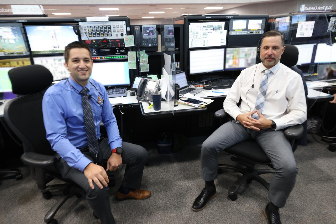 NASA Test Directors Daniel Florez, left, and Carlos Monje, are seated at consoles inside Firing Room 1 of the Launch Control Center at NASA’s Kennedy Space Center in Florida on Dec. 13, 2021. They are participating in a joint integrated simulation for the Artemis I launch that covered both cryogenic loading and terminal countdown portions of prelaunch activities. Members of NASA’s mission management team and launch team conducted the simulation together. The Kennedy team was certified for the Artemis I launch. During Artemis I, the agency’s Orion spacecraft will lift off from Kennedy aboard NASA’s most powerful rocket – the Space Launch System – to fly farther than any spacecraft built for humans has ever flown. Through NASA’s Artemis missions, the agency, along with commercial and international partners, will establish a sustainable human presence on the Moon to prepare for missions to Mars. 