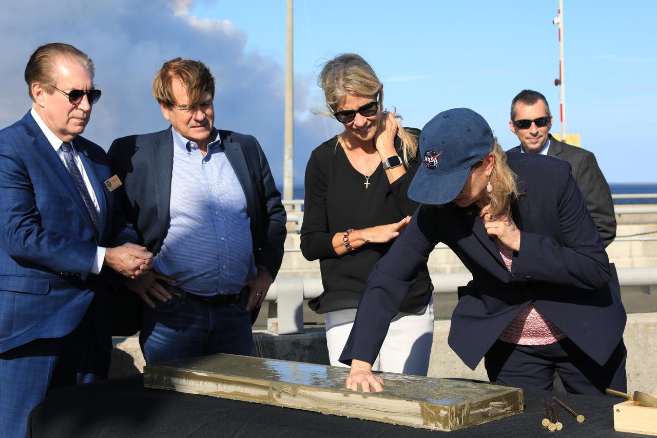 Center Director Janet Petro joins partners and elected officials for a groundbreaking ceremony on a new NASA Causeway bridge over the Indian River leading to NASA’s Kennedy Space Center on Merritt Island in Florida. The construction is made possible through a $90M Infrastructure for Rebuilding America (INFRA) grant, which was awarded thanks to an extensive effort by NASA, the State of Florida – through Florida Department of Transportation and Space Florida – as well as support from industry partners, other local, state, and federal government agencies. The new bridge enables Kennedy’s growth as a multi-user spaceport and will allow NASA to better support the space industry. Construction is scheduled to take several years. To commemorate the day, speakers left a handprint and signed their name in cement. 