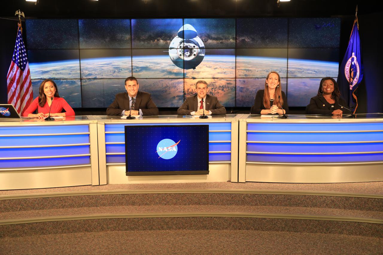 From left, Megan Cruz, NASA Communications; Joel Montalbano, manager, International Space Station Program; Dr. Bob Dempsey, acting deputy chief scientist, International Space Station Program; Sarah Walker, director, Dragon mission management, SpaceX; and Arlena Moses, launch weather officer, 45th Weather Squadron, Cape Canaveral Space Force Station, participate in NASA’s SpaceX 24th commercial resupply services mission prelaunch news conference at Kennedy Space Center in Florida on Tuesday, Dec. 20, 2021. Liftoff of the SpaceX Falcon 9 rocket with the company’s Dragon spacecraft on board is targeted for Tuesday, Dec. 21, 2021, at 5:07 a.m. EST. The mission will deliver new science investigations, supplies, and equipment to the crew on board the International Space Station.