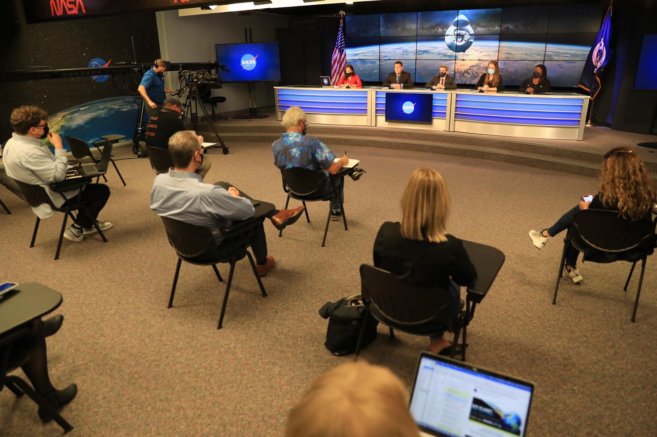 Media members participate in NASA’s SpaceX 24th commercial resupply services mission prelaunch news conference at Kennedy Space Center in Florida on Tuesday, Dec. 20, 2021. Participants included Joel Montalbano, manager, International Space Station Program; Dr. Bob Dempsey, acting deputy chief scientist, International Space Station Program; Sarah Walker, director, Dragon mission management, SpaceX; and Arlena Moses, launch weather officer, 45th Weather Squadron, Cape Canaveral Space Force Station. NASA Communications’ Megan Cruz moderated the event. Liftoff of the SpaceX Falcon 9 rocket with the company’s Dragon spacecraft on board is targeted for Tuesday, Dec. 21, 2021, at 5:07 a.m. EST. The mission will deliver new science investigations, supplies, and equipment to the crew on board the International Space Station.