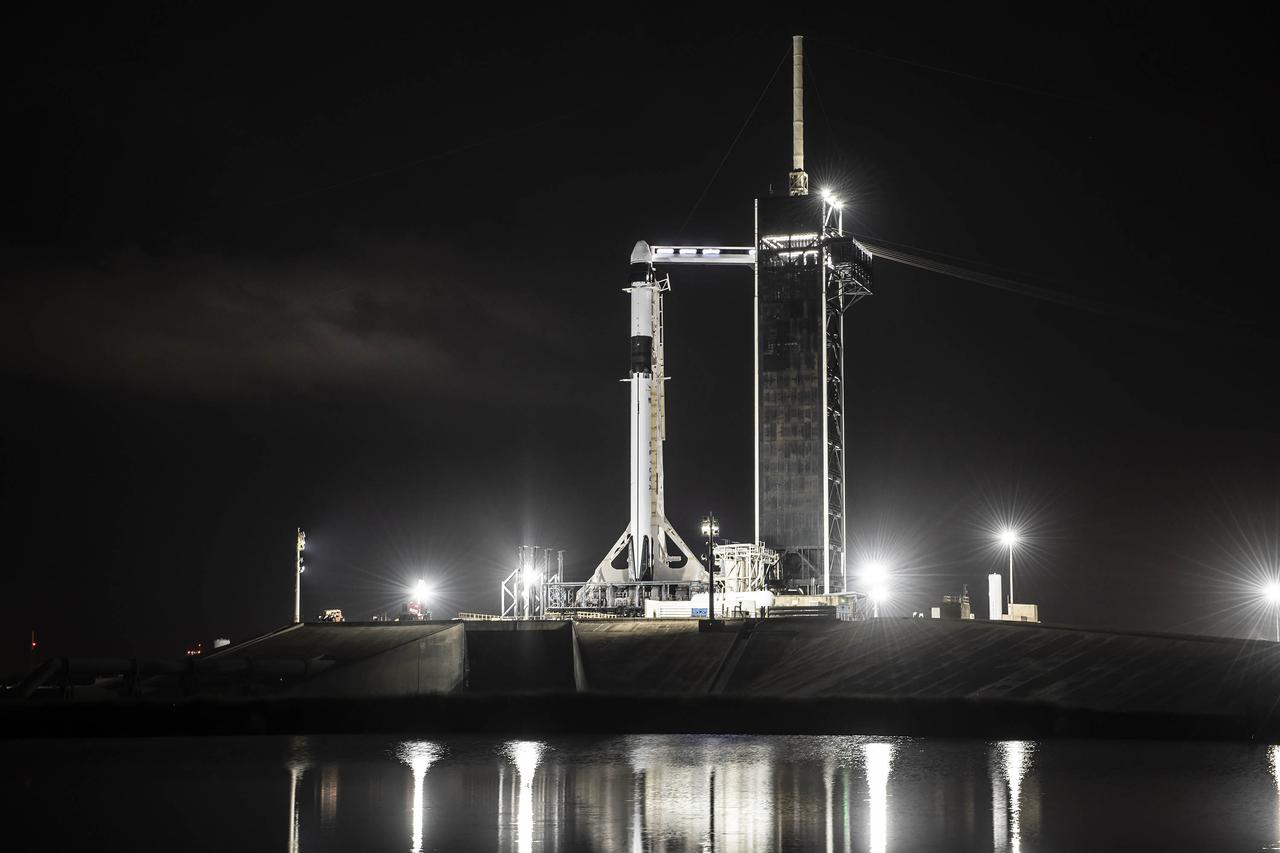 SpaceX's Falcon 9 rocket with Dragon spacecraft rolls out to Launch Complex 39A at NASA's Kennedy Space Center in Florida on Dec. 19, 2021, in preparation for launch. The agency's 24th Commercial Resupply Services mission, targeted for liftoff on Dec. 21, 2021 at 5:06 a.m. EST, will deliver new science investigations, supplies, and equipment to the crew on board the International Space Station.