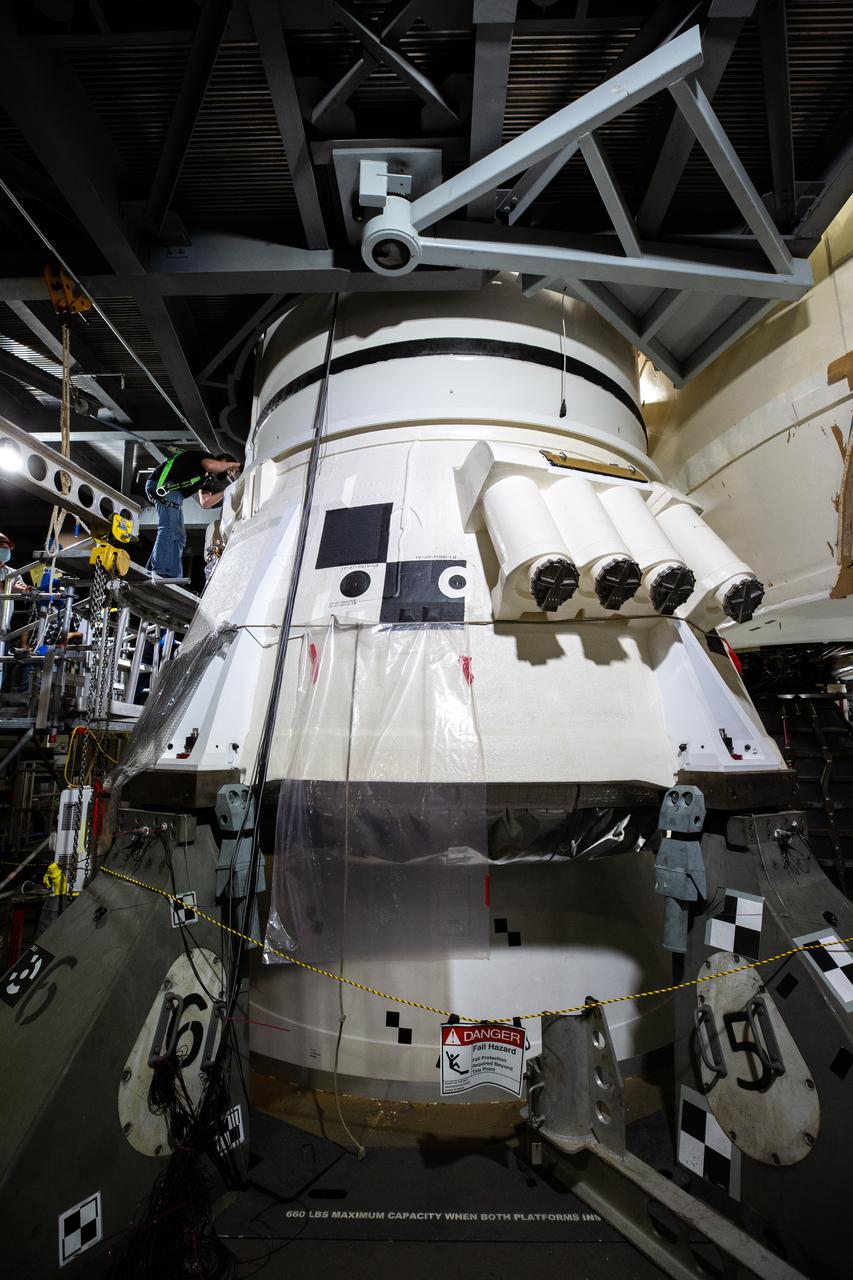 A close-up view of the aft segment of one of the boosters for the Artemis I Space Launch System rocket inside High Bay 3 of the Vehicle Assembly Building at NASA’s Kennedy Space Center in Florida on Jan. 10, 2022. Artemis I will be the first integrated test of NASA’s deep space exploration systems: the Orion spacecraft, Space Launch System (SLS) rocket and the ground systems at Kennedy.. In later missions, NASA will land the first woman and the first person of color on the surface of the Moon, paving the way for a long-term lunar presence and serving as a steppingstone on the way to Mars. 