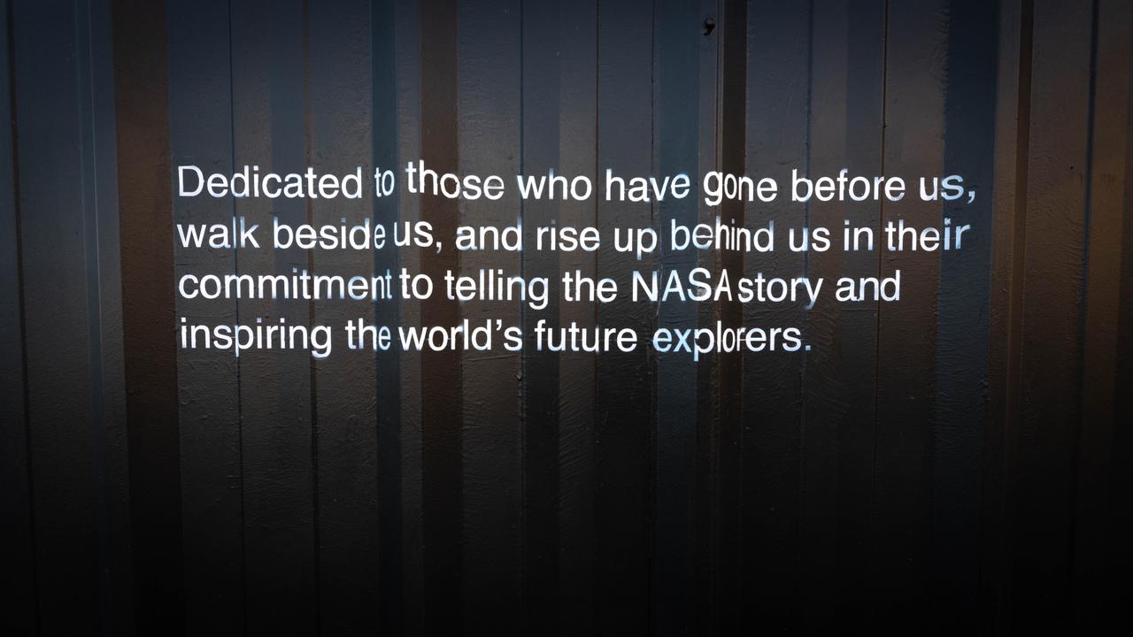 A dedication to those who tell the NASA story is part of a mural painted by Florida artist Christopher Maslow on the northwest exterior wall of the Press Site News Facility at NASA’s Kennedy Space Center in Florida, photographed on Jan. 10, 2022. Completed by the artist over the course of several months during 2021, the largescale artwork depicts notable landmarks, missions, and milestones from the history of NASA and its world-famous spaceport. The Press Site News Facility is the hub of launch broadcasts and home to the center’s TV auditorium. Along with the nearby NASA News Center, for decades Kennedy’s Press Site has been where reporters from television, radio, print, and online media outlets have monitored countless launches, landings, and other space events in order to deliver the news to the world. 