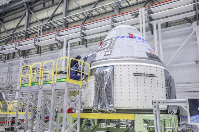 NASA image: Starliner Technicians Working On OFT-2 Vehicle