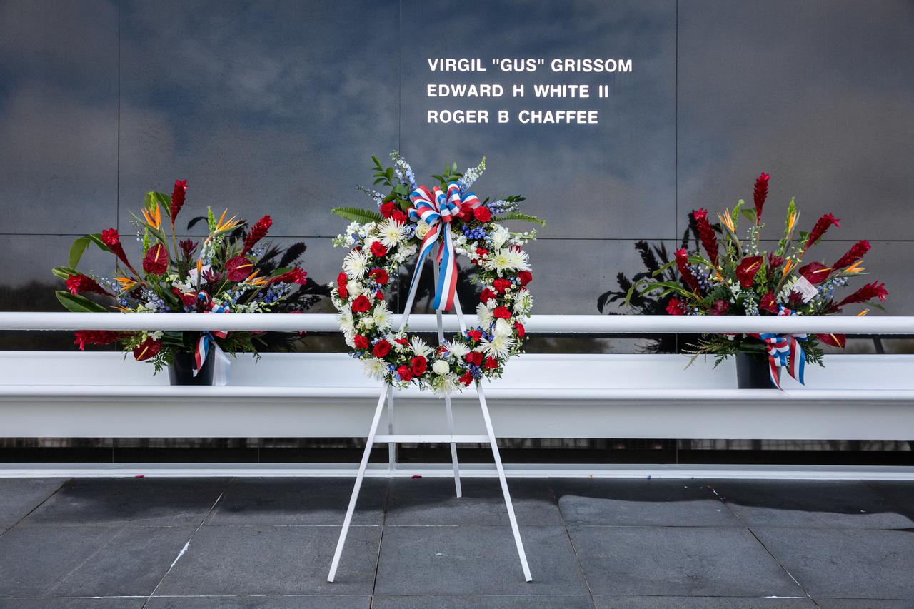 A wreath is placed in front of the Space Mirror Memorial at NASA’s Kennedy Space Center Visitor Complex during the NASA Day of Remembrance on Jan. 27, 2022. Kennedy Space Center in Florida paid tribute to the crews of Apollo 1 and space shuttles Challenger and Columbia, as well as other astronauts who lost their lives while furthering the cause of exploration and discovery.