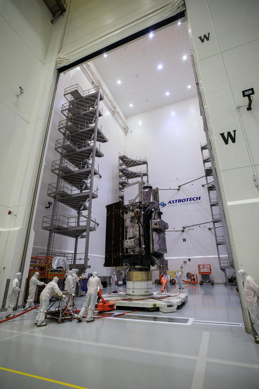 Technicians move NOAA’s Geostationary Operational Environmental Satellite-T (GOES-T) inside the Astrotech Space Operations facility in Titusville, Florida, on Jan. 28, 2022. The spacecraft is being prepared for encapsulation inside its protective payload fairings. GOES-T is scheduled to launch on March 1, 2022, atop a United Launch Alliance (ULA) Atlas V 541 rocket from Space Launch Complex 41 at Cape Canaveral Space Force Station. GOES-T is the third satellite in the GOES-R series that will continue to help meteorologists observe and predict local weather events that affect public safety. The launch is being managed by NASA’s Launch Services Program based at Kennedy Space Center in Florida, America’s multi-user spaceport. 
