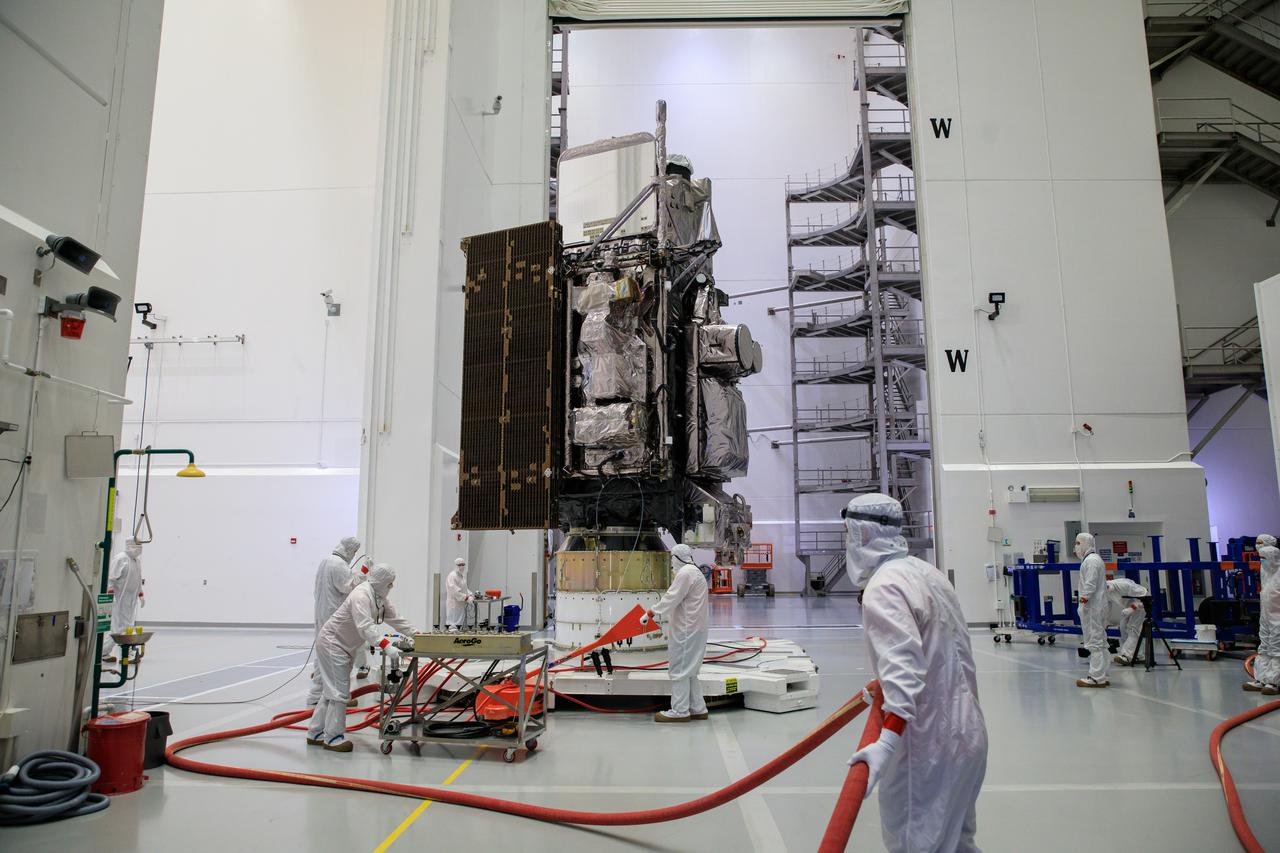 Technicians prepare NOAA’s Geostationary Operational Environmental Satellite-T (GOES-T) for encapsulation in its protective payload fairings inside the Astrotech Space Operations facility in Titusville, Florida, on Jan. 28, 2022. GOES-T is scheduled to launch on March 1, 2022, atop a United Launch Alliance (ULA) Atlas V 541 rocket from Space Launch Complex 41 at Cape Canaveral Space Force Station. GOES-T is the third satellite in the GOES-R series that will continue to help meteorologists observe and predict local weather events that affect public safety. The launch is being managed by NASA’s Launch Services Program based at Kennedy Space Center in Florida, America’s multi-user spaceport. 