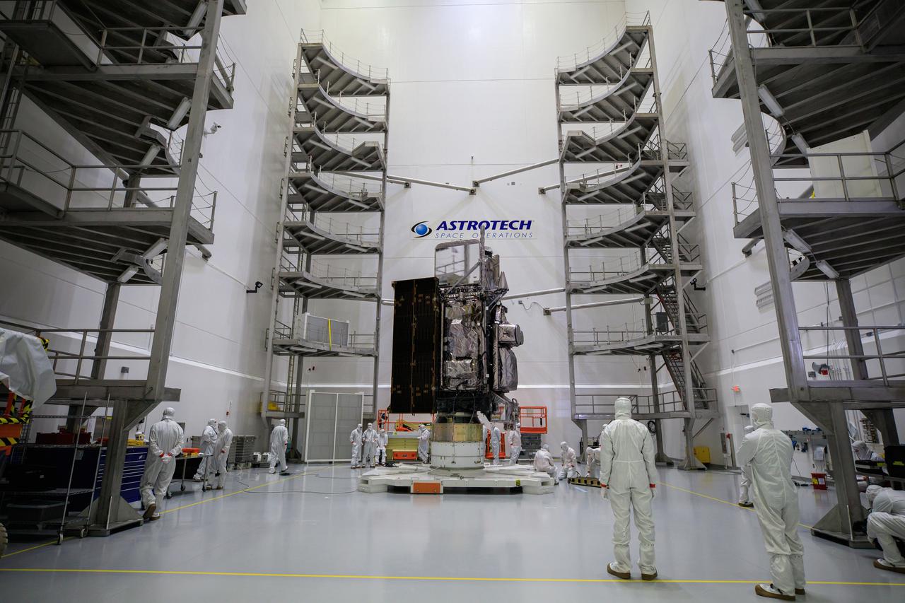 Technicians move NOAA’s Geostationary Operational Environmental Satellite-T (GOES-T) inside the Astrotech Space Operations facility in Titusville, Florida, on Jan. 28, 2022. The spacecraft is being prepared for encapsulation inside its protective payload fairings. GOES-T is scheduled to launch on March 1, 2022, atop a United Launch Alliance (ULA) Atlas V 541 rocket from Space Launch Complex 41 at Cape Canaveral Space Force Station. GOES-T is the third satellite in the GOES-R series that will continue to help meteorologists observe and predict local weather events that affect public safety. The launch is being managed by NASA’s Launch Services Program based at Kennedy Space Center in Florida, America’s multi-user spaceport. 