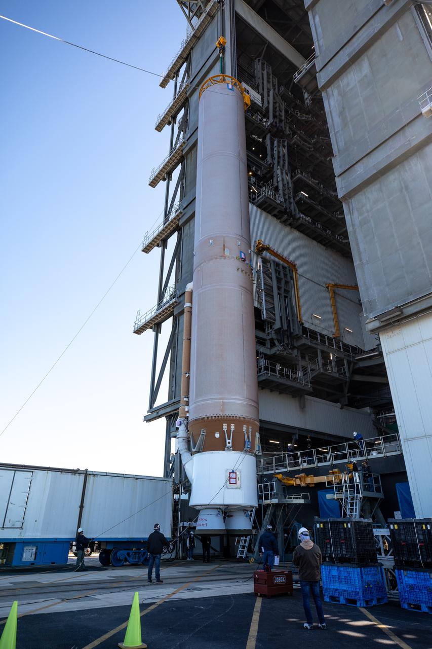 A crane is used to lift the United Launch Alliance’s (ULA) first stage of the Atlas V 541 rocket vertical for its move into the Space Launch Complex-41 Vertical Integration Facility at Cape Canaveral Space Force Station in Florida on Jan. 31, 2022. The Atlas V will launch the National Oceanic and Atmospheric Administration’s (NOAA) Geostationary Operational Environmental Satellite T (GOES-T). GOES-T is the third satellite in the GOES-R series that will continue to help meteorologists observe and predict local weather events that affect public safety. GOES-T is scheduled to launch from Space Launch Complex-41 on March 1, 2022. The launch is being managed by NASA’s Launch Services Program based at Kennedy Space Center, America’s multi-user spaceport.