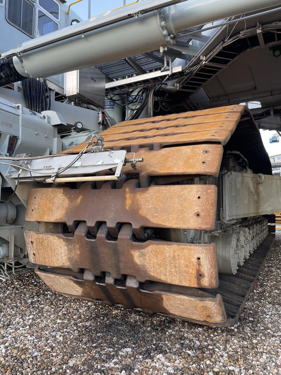 Eight new NASA Artemis logos (four large, four small) were installed on Crawler-Transporter 2 at Kennedy Space Center in preparation for the upcoming launch of Artemis I. Named after the twin sister of Apollo, Artemis is the Goddess of the Moon. The Artemis missions will take humanity back to the Moon and beyond, beginning a new legacy of deep space exploration.