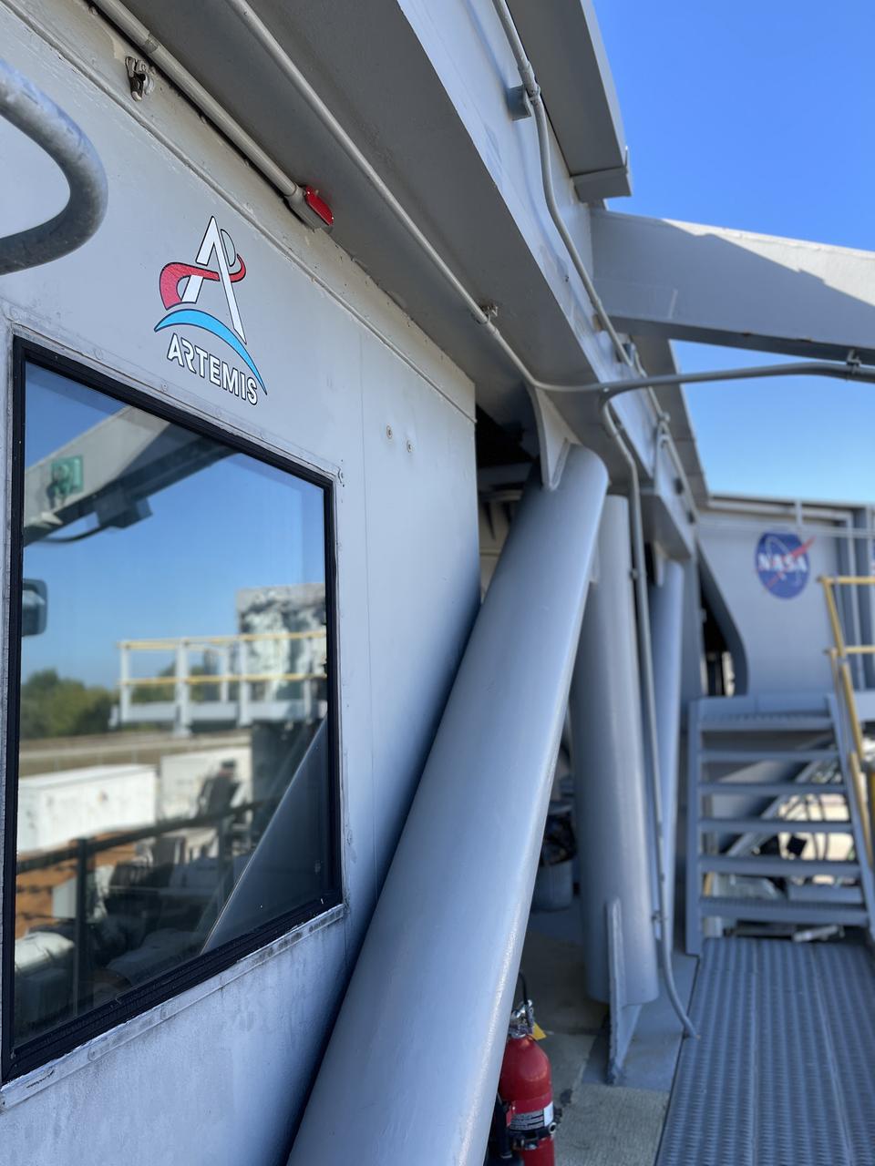 Eight new NASA Artemis logos (four large, four small) were installed on Crawler-Transporter 2 at Kennedy Space Center in preparation for the upcoming launch of Artemis I. Named after the twin sister of Apollo, Artemis is the Goddess of the Moon. The Artemis missions will take humanity back to the Moon and beyond, beginning a new legacy of deep space exploration.
