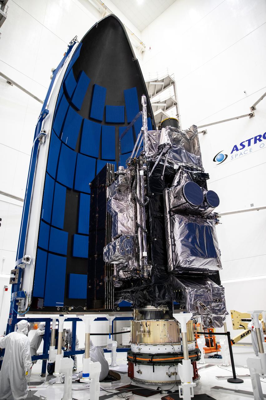 The first half of the United Launch Alliance Atlas V payload fairing is moved toward NOAA’s Geostationary Operational Environmental Satellite-T (GOES-T) inside the Astrotech Space Operations facility in Titusville, Florida, on Feb. 7, 2022. The satellite will be encapsulated inside the payload fairings, which will protect it during launch. GOES-T is scheduled to launch on March 1, 2022, atop Atlas V 541 rocket from Space Launch Complex 41 at Cape Canaveral Space Force Station. GOES-T is the third satellite in the GOES-R series that will continue to help meteorologists observe and predict local weather events that affect public safety. The launch is being managed by NASA’s Launch Services Program based at Kennedy Space Center in Florida, America’s multi-user spaceport.