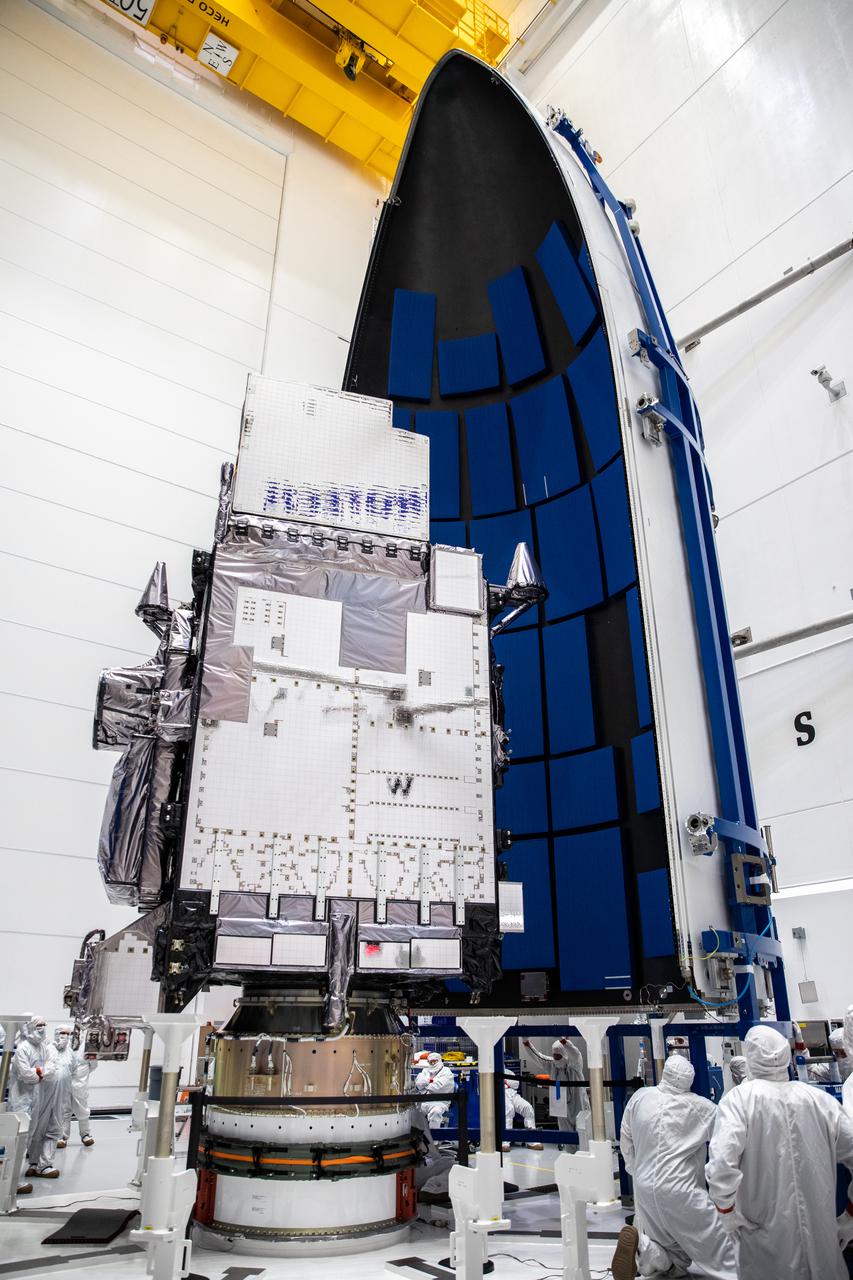 The first half of the United Launch Alliance Atlas V payload fairing is moved toward NOAA’s Geostationary Operational Environmental Satellite-T (GOES-T) inside the Astrotech Space Operations facility in Titusville, Florida, on Feb. 7, 2022. The satellite will be encapsulated inside the payload fairings, which will protect it during launch. GOES-T is scheduled to launch on March 1, 2022, atop Atlas V 541 rocket from Space Launch Complex 41 at Cape Canaveral Space Force Station. GOES-T is the third satellite in the GOES-R series that will continue to help meteorologists observe and predict local weather events that affect public safety. The launch is being managed by NASA’s Launch Services Program based at Kennedy Space Center in Florida, America’s multi-user spaceport.
