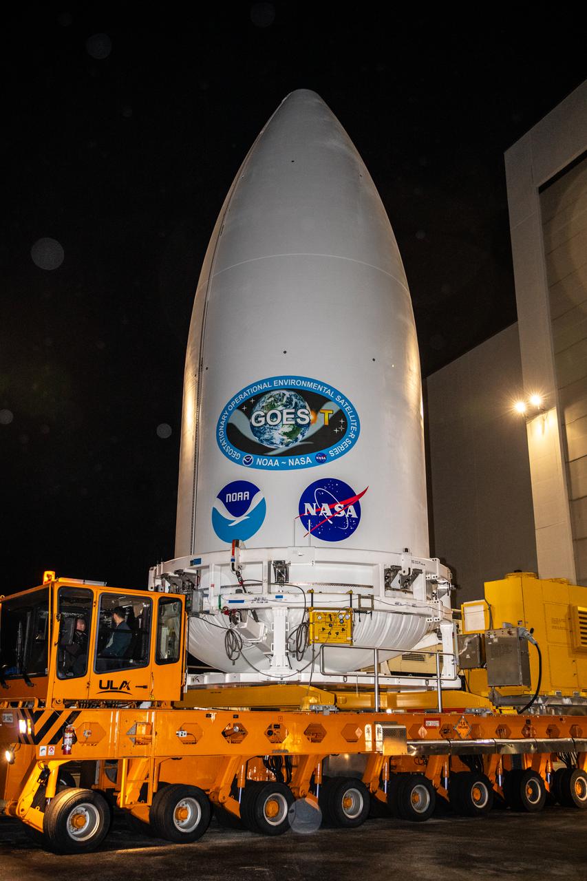 The National Oceanic and Atmospheric Administration’s (NOAA) Geostationary Operational Environmental Satellite-T (GOES-T), enclosed in its payload fairing, exits the Astrotech Space Operations facility in Titusville, Florida, for its trip to the Vertical Integration Facility at Space Launch Complex 41 at Cape Canaveral Space Force Station in Florida on Feb. 17, 2022. The satellite will be lifted up inside the integration facility and secured to the United Launch Alliance Atlas V 541 rocket. GOES-T is scheduled to launch atop the Atlas V rocket from SLC-41 on March 1, 2022, at 4:38 p.m. GOES-T is the third satellite in the GOES-R series that will continue to help meteorologists observe and predict local weather events that affect public safety. The launch is being managed by NASA’s Launch Services Program based at Kennedy Space Center in Florida, America’s multi-user spaceport.