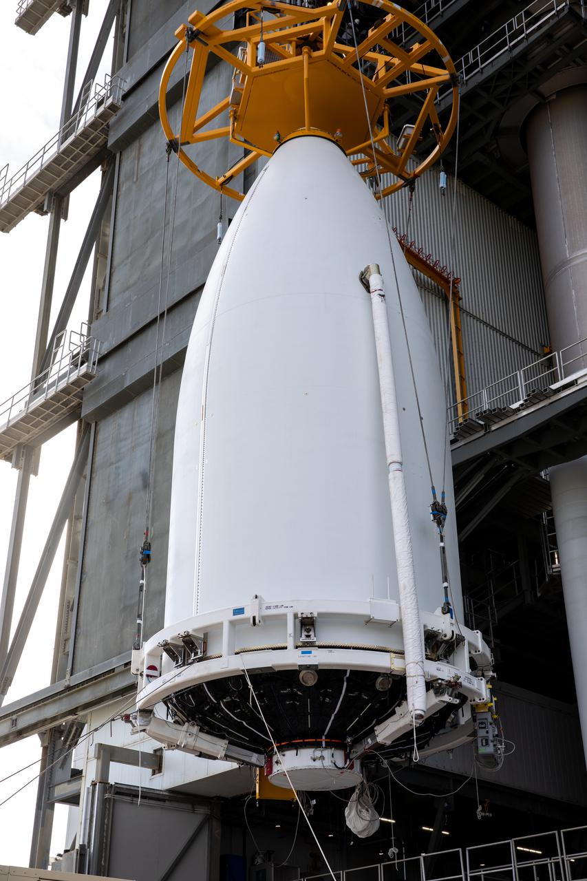 The National Oceanic and Atmospheric Administration’s (NOAA) Geostationary Operational Environmental Satellite-T (GOES-T), enclosed in its payload fairing, is lifted up by crane for its move into the Vertical Integration Facility at Space Launch Complex 41 at Cape Canaveral Space Force Station in Florida on Feb. 17, 2022. The satellite will be secured atop the United Launch Alliance Atlas V 541 rocket. GOES-T is scheduled to launch atop the Atlas V rocket from SLC-41 on March 1, 2022, at 4:38 p.m. GOES-T is the third satellite in the GOES-R series that will continue to help meteorologists observe and predict local weather events that affect public safety. The launch is being managed by NASA’s Launch Services Program based at Kennedy Space Center in Florida, America’s multi-user spaceport.