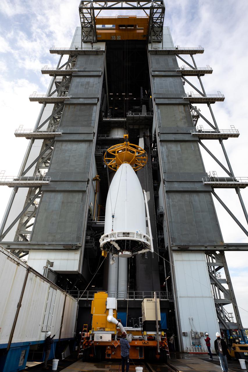 The National Oceanic and Atmospheric Administration’s (NOAA) Geostationary Operational Environmental Satellite-T (GOES-T), enclosed in its payload fairing, is lifted up by crane for its move into the Vertical Integration Facility at Space Launch Complex 41 at Cape Canaveral Space Force Station in Florida on Feb. 17, 2022. The satellite will be secured atop the United Launch Alliance Atlas V 541 rocket. GOES-T is scheduled to launch atop the Atlas V rocket from SLC-41 on March 1, 2022, at 4:38 p.m. GOES-T is the third satellite in the GOES-R series that will continue to help meteorologists observe and predict local weather events that affect public safety. The launch is being managed by NASA’s Launch Services Program based at Kennedy Space Center in Florida, America’s multi-user spaceport.