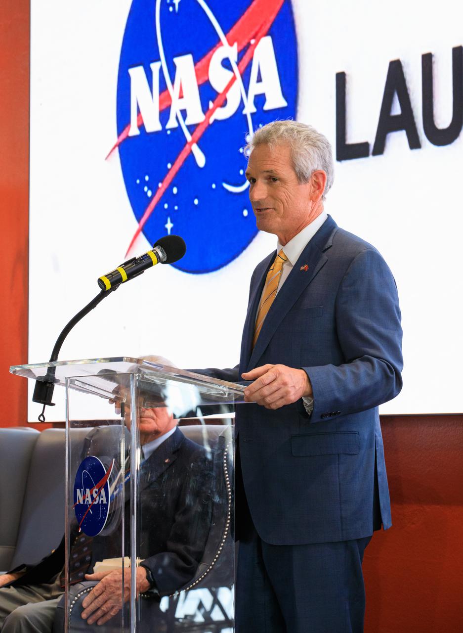 Scott Rigell, speaking on behalf of Ike Rigell, retired Apollo chief engineer and deputy director of launch vehicle operations at NASA, addresses attendees during a ceremony renaming Kennedy Space Center’s launch control center to the Rocco A. Petrone Launch Control Center on Feb. 22, 2022. Petrone was instrumental in America’s first voyages to the Moon and headed the Apollo program. He died in 2006 at the age of 80.