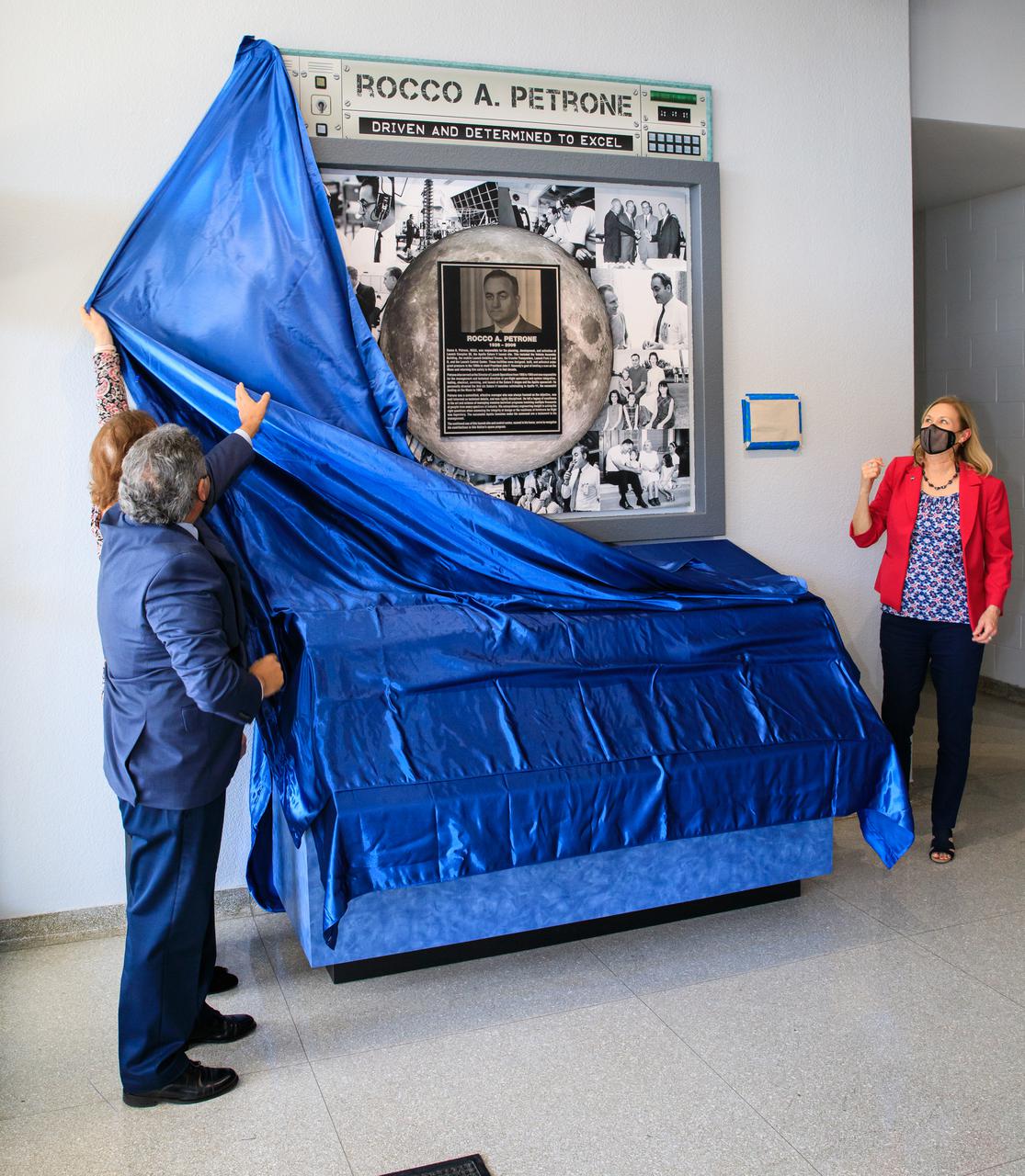 A display dedicated to former Kennedy Space Center launch director Rocco Petrone is unveiled at Kennedy Space Center on Feb. 22, 2022. During a ceremony held at the Florida spaceport, Kennedy’s launch control center was officially renamed to the Rocco A. Petrone Launch Control Center. Petrone was instrumental in America’s first voyages to the Moon and headed the Apollo program. He died in 2006 at the age of 80.