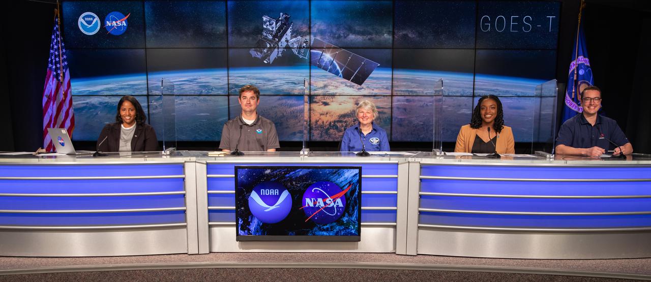 A science briefing for the National Oceanic and Atmospheric Administration’s (NOAA) Geostationary Operational Environmental Satellite-T (GOES-T) is held on Feb. 25, 2022, at NASA’s Kennedy Space Center in Florida. Participants from left, are Tylar Greene, briefing moderator, NASA Communications; Dr. Dan Lindsey, GOES-R program scientist, NOAA; Candace Carlisle, GOES-R flight project manager, NASA’s Goddard Space Flight Center; Tewa Kpulun, Geostationary Lightning Mapper science lead, Lockheed Martin; and Daniel Gall, Advanced Baseline Imager chief systems engineer, Space and Airborne Systems, L3 Harris Technologies, participates in the briefing. GOES-T is scheduled to lift off on a United Launch Alliance Atlas V 541 rocket from Space Launch Complex 41 at Cape Canaveral Space Force Station in Florida on March 1, 2022, at 4:38 p.m. GOES-T is the third satellite in the GOES-R series that will continue to help meteorologists observe and predict local weather events that affect public safety. The launch is being managed by NASA’s Launch Services Program based at Kennedy Space Center in Florida, America’s multi-user spaceport. 