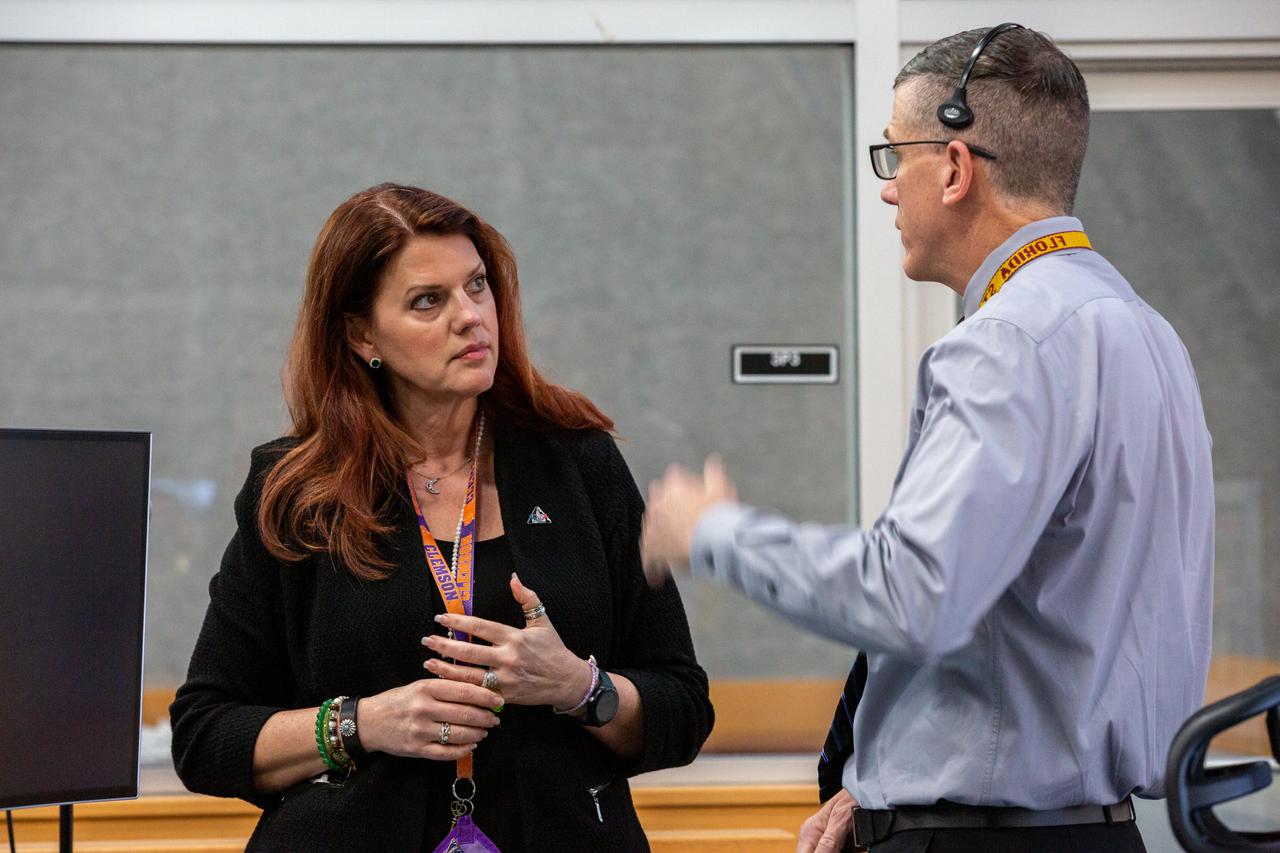 Artemis I Launch Director Charlie Blackwell-Thompson, left, and Assistant Launch Director Jeremy Graeber participate in a wet dress rehearsal for the Artemis I mission on April 14, 2022, inside Firing Room 1 in the Launch Control Center at NASA’s Kennedy Space Center in Florida. The wet dress rehearsal is the final major test before launch and allows the launch team to run through all countdown operations prior to liftoff. The first in an increasingly complex series of missions, Artemis I will test NASA’s Space Launch System rocket and Orion spacecraft as an integrated system prior to crewed flights to the Moon. 