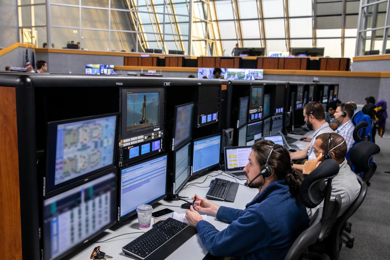 Members of the Artemis I launch team participate in a wet dress rehearsal for the Artemis I mission on April 14, 2022, inside the Launch Control Center at NASA’s Kennedy Space Center in Florida. The wet dress rehearsal is the final major test before launch and allows the team to run through all countdown operations prior to liftoff. The first in an increasingly complex series of missions, Artemis I will test NASA’s Space Launch System rocket and Orion spacecraft as an integrated system prior to crewed flights to the Moon.