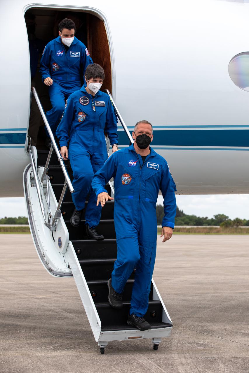 Crew members for NASA’s SpaceX Crew-4 mission to the International Space Station arrive at the Launch and Landing Facility at Kennedy Space Center in Florida on April 18, 2022. From the front are NASA astronaut Bob Hines, ESA (European Space Agency) astronaut Samantha Cristoforetti, and NASA astronaut Jessica Watkins. Not in the photo is NASA astronaut Kjell Lindgren. The crew will enter quarantine at the center’s astronaut crew quarters as they await launch aboard SpaceX’s Crew Dragon and Falcon 9 rocket. Launch is targeted for 5:26 a.m. EDT on April 23, 2022, from Launch Complex 39A. Crew-4 is the fourth crew rotation flight to the space station as part of NASA’s Commercial Crew Program. 