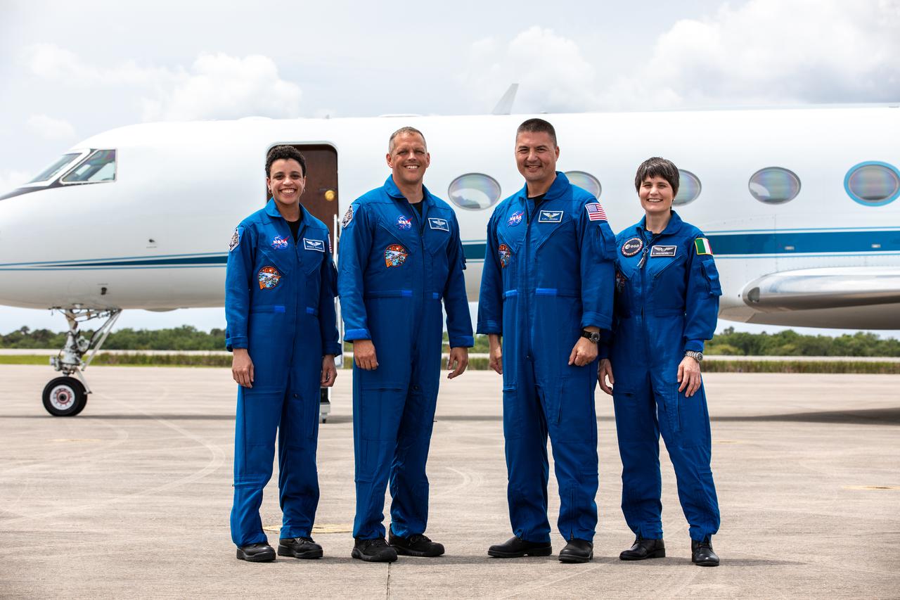 SpaceX Crew-4 astronauts, from left, Jessica Watkins, Bob Hines, and Kjell Lindgren, along with ESA (European Space Agency) astronaut Samantha Cristoforetti, pause for a photograph after arriving at the Launch and Landing Facility at Kennedy Space Center in Florida on April 18, 2022. The astronauts will enter quarantine at the center’s astronaut crew quarters, as they await launch aboard the Crew Dragon on a SpaceX Falcon 9 rocket. Launch is targeted for 5:26 a.m. EDT on April 23, 2022, from Kennedy’s Launch Complex 39A. 
