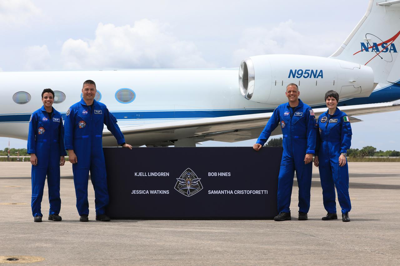 Crew members for NASA’s SpaceX Crew-4 mission to the International Space Station arrive at the Launch and Landing Facility at Kennedy Space Center in Florida on April 18, 2022. From left, are NASA astronauts Jessica Watkins, Kjell Lindgren and Bob Hines, and Samantha Cristoforetti, ESA (European Space Agency) astronaut. The crew will enter quarantine at the center’s astronaut crew quarters as they await launch aboard SpaceX’s Crew Dragon and Falcon 9 rocket. Launch is targeted for 5:26 a.m. EDT on April 23, 2022, from Launch Complex 39A. Crew-4 is the fourth crew rotation flight to the space station as part of NASA’s Commercial Crew Program. 