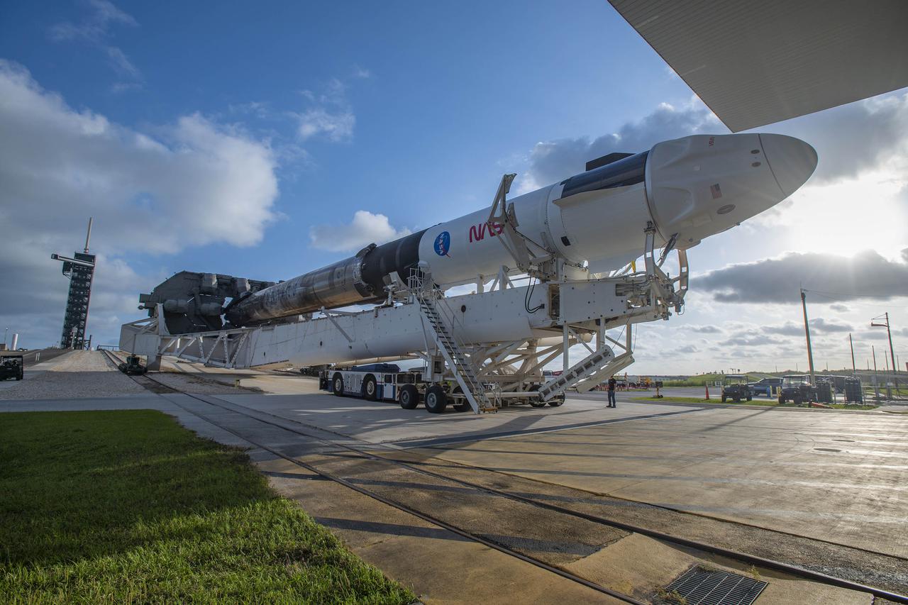 SpaceX’s Crew Dragon – named Freedom by the Crew-4 astronauts – atop the company’s Falcon 9 rocket, leaves the SpaceX integration hangar adjacent to NASA Kennedy Space Center’s Launch Complex 39A for rollout to the launch pad on April 19, 2022. NASA astronauts Kjell Lindgren, Bob Hines, and Jessica Watkins, and ESA (European Space Agency) astronaut Samantha Cristoforetti, who arrived at Kennedy one day ago, will fly to the International Space Station on NASA’s SpaceX Crew-4 mission. Liftoff is targeted for Saturday, April 23, at 5:26 a.m. EDT.