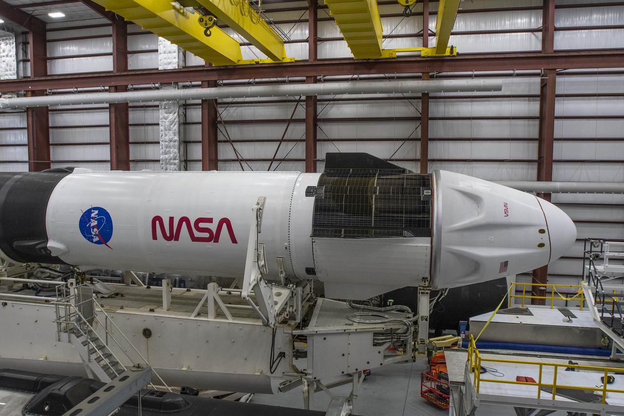 SpaceX’s Crew Dragon – named Freedom by the Crew-4 astronauts – atop the company’s Falcon 9 rocket, is shown inside the SpaceX integration hangar adjacent to NASA Kennedy Space Center’s Launch Complex 39A on April 19, 2022, just before rollout to the launch pad. NASA astronauts Kjell Lindgren, Bob Hines, and Jessica Watkins, and ESA (European Space Agency) astronaut Samantha Cristoforetti, who arrived at Kennedy one day ago, will fly to the International Space Station on NASA’s SpaceX Crew-4 mission. Liftoff is targeted for Saturday, April 23, at 5:26 a.m. EDT.