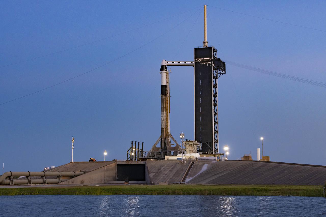 The SpaceX Falcon 9 rocket is vertical with the company’s Crew Dragon atop for NASA’s SpaceX Crew-4 mission at Launch Pad 39A at NASA’s Kennedy Space Center in Florida on April 19, 2022. NASA astronauts Kjell Lindgren, Bob Hines, and Jessica Watkins, along with ESA (European Space Agency) astronaut Samantha Cristoforetti, will launch aboard Dragon, named Freedom by the Crew-4 crew, atop the Falcon 9 on April 23, 2022, to the International Space Station. Launch is targeted for 5:26 a.m. EDT from Pad 39A. The astronauts will conduct scientific research in areas such as materials science, health technologies, and plant science to prepare for human exploration beyond low-Earth orbit.