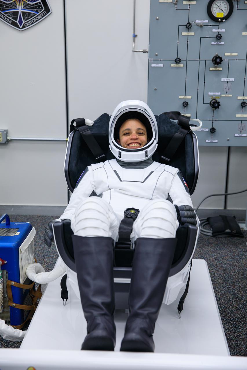 NASA astronaut Jessica Watkins smiles in the suit room inside Kennedy Space Center’s Neil A. Armstrong Operations and Checkout Building during NASA’s SpaceX Crew-4 dry dress rehearsal on April 20, 2022. Watson, along with fellow Crew-4 astronauts Kjell Lindgren, Bob Hines, and Samantha Cristoforetti, is scheduled to lift off from Kennedy’s Launch Complex 39A at 5:26 a.m. EDT on April 23, 2022. SpaceX’s Falcon 9 rocket and Crew Dragon, named Freedom by the Crew-4 crew, will launch the astronauts to the space station as part of NASA’s Commercial Crew Program.