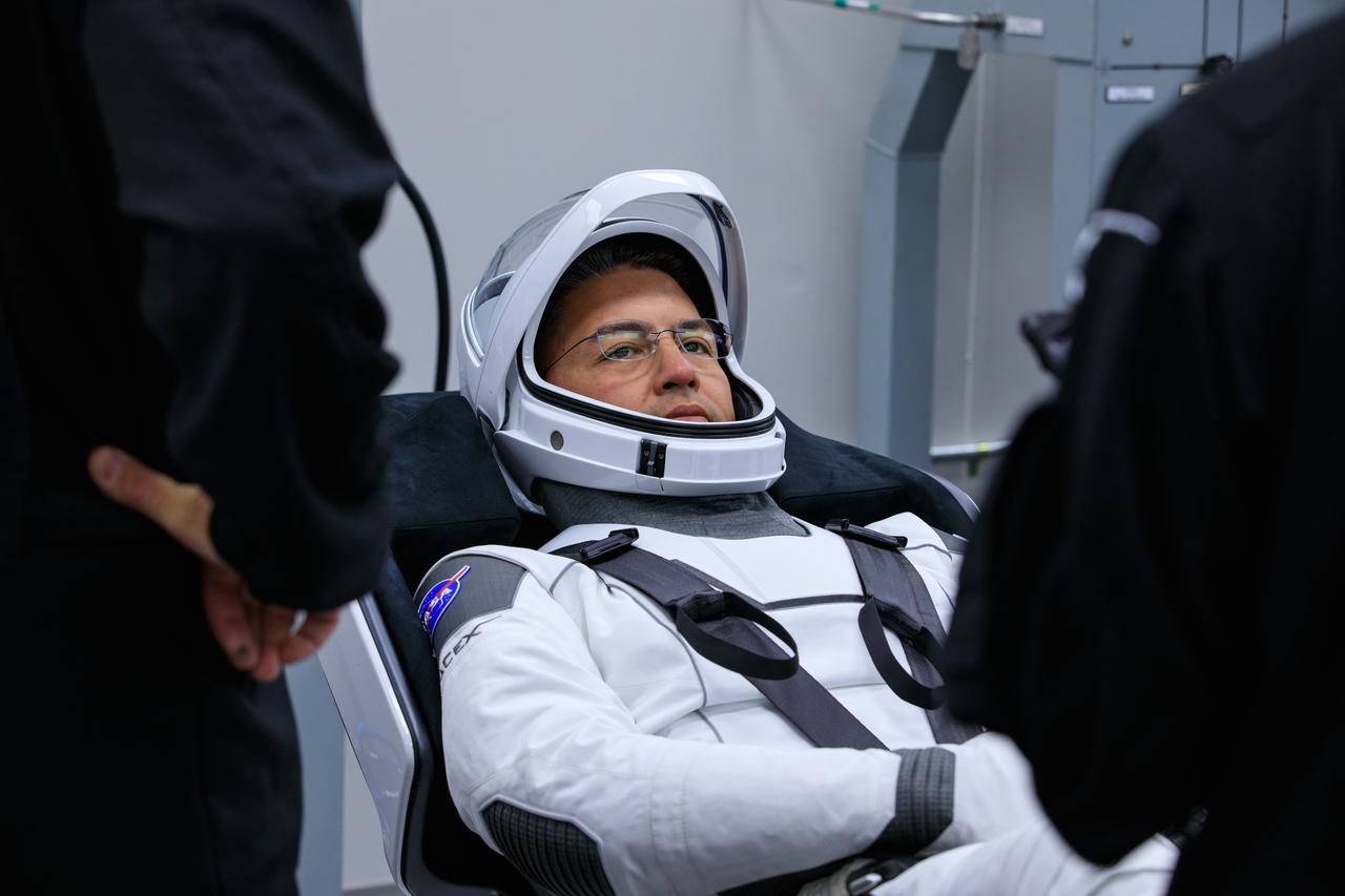 NASA astronaut Kjell Lindgren gets assistance in the suit room inside Kennedy Space Center’s Neil A. Armstrong Operations and Checkout Building during NASA’s SpaceX Crew-4 dry dress rehearsal on April 20, 2022. Watson, along with fellow Crew-4 astronauts Jessica Watkins, Bob Hines, and Samantha Cristoforetti, is scheduled to lift off from Kennedy’s Launch Complex 39A at 5:26 a.m. EDT on April 23, 2022. SpaceX’s Falcon 9 rocket and Crew Dragon, named Freedom by the Crew-4 crew, will launch the astronauts to the International Space Station as part of NASA’s Commercial Crew Program.