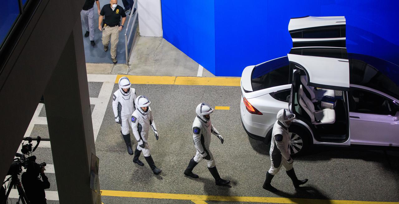 Crew-4 mission astronauts Bob Hines, Kjell Lindgren, Jessica Watkins, and Samantha Cristoforetti walk out of Kennedy Space Center’s Neil A. Armstrong Operations and Checkout Building during a dry dress rehearsal on April 20, 2022. A team of SpaceX suit technicians assisted them as they put on their custom-fitted spacesuits and checked the suits for leaks. SpaceX’s Falcon 9 rocket and Crew Dragon, named Freedom by the Crew-4 crew, will launch the astronauts to the International Space Station as part of NASA’s Commercial Crew Program. The mission is scheduled to lift off at 5:26 a.m. EDT on April 23, 2022, from Launch Complex 39A at Kennedy.