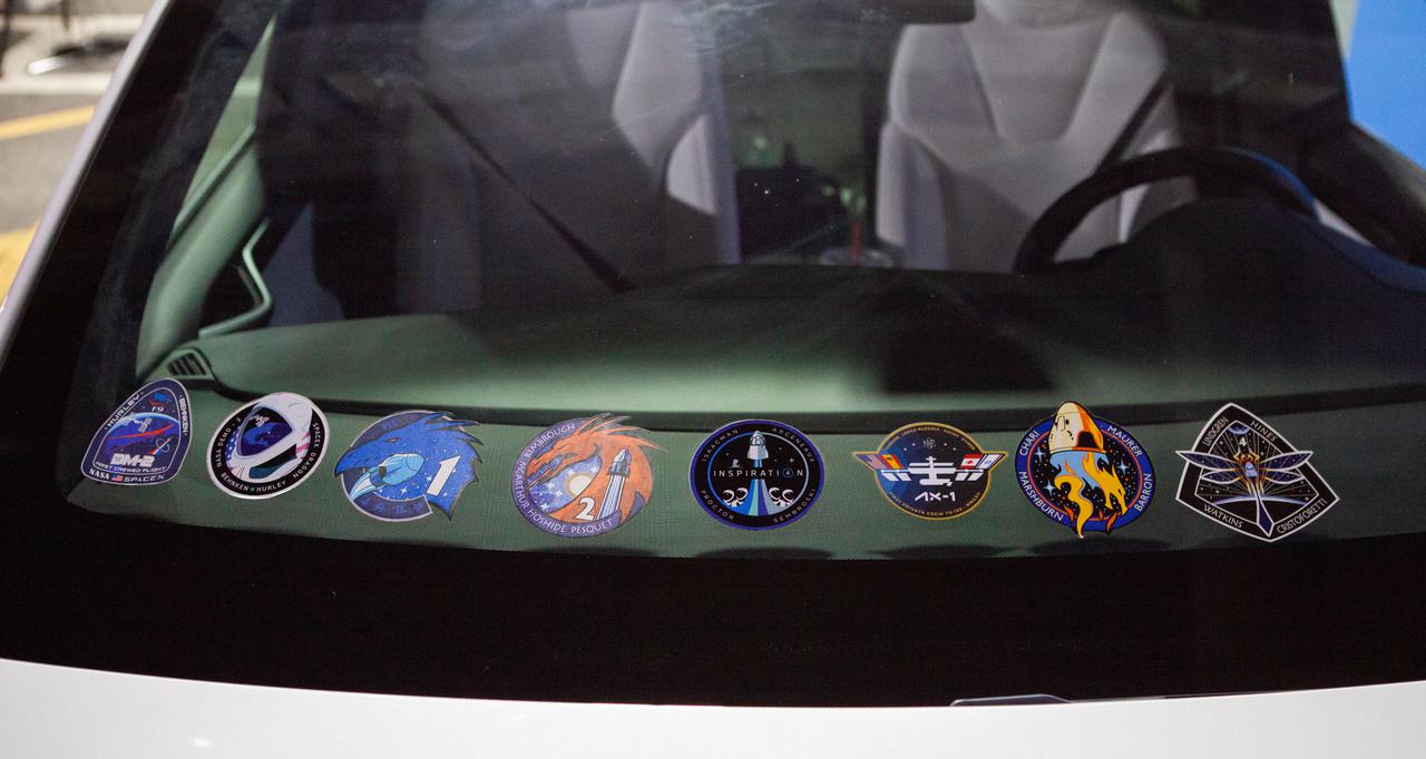 A customized Tesla Model X vehicle is parked outside the Neil A. Armstrong Operations and Checkout Building at NASA’s Kennedy Space Center in Florida on April 27, 2022. Crew-4 astronauts Kjell Lindgren, Bob Hines, Jessica Watkins, and Samantha Cristoforetti will make their way to the vehicles, which will transport them to Launch Complex 39A. Liftoff aboard SpaceX’s Crew Dragon, powered by the company’s Falcon 9 rocket, is scheduled for today at 3:52 a.m. EDT from Pad 39A at Kennedy.