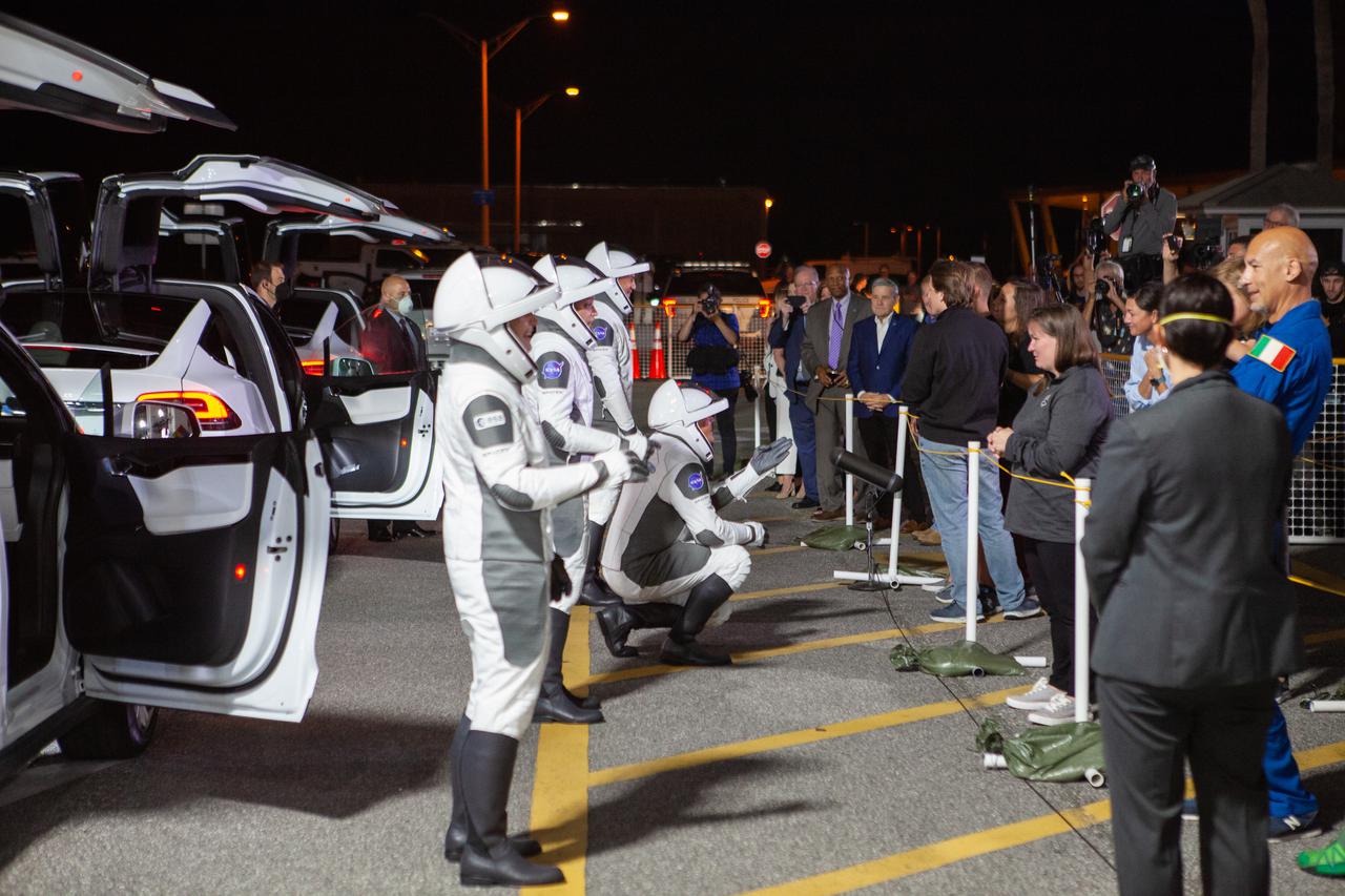 Crew-4 astronauts Kjell Lindgren, Samantha Cristoforetti, Bob Hines, and Jessica Watkins wave to their families outside of the Neil Armstrong Operations and Checkout Building at NASA’s Kennedy Space Center in Florida before getting into the customized Tesla Model X vehicles that will transport them to their spacecraft at Launch Complex 39A. SpaceX’s Crew Dragon, powered by the company’s Falcon 9 rocket, will carry the four-person crew to the International Space Station as part of NASA’s Commercial Crew Program. Crew-4 is scheduled to launch today at 3:52 a.m. EDT, from Pad 39A at Kennedy.