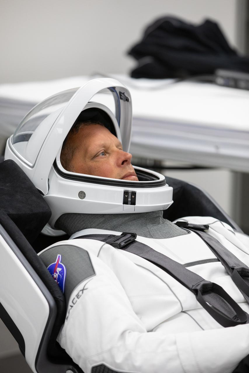 Crew-4 mission astronaut Bob Hines relaxes in the suit room in the Astronaut Crew Quarters inside Kennedy Space Center’s Neil A. Armstrong Operations and Checkout Building on April 27, 2022. A team of SpaceX suit technicians assisted the crew as they put on their custom-fitted spacesuits and checked the suits for leaks. Hines, along with Samantha Cristoforetti, Kjell Lindgren, and Jessica Watkins, will launch aboard SpaceX’s Crew Dragon, powered by the company’s Falcon 9 rocket, to the International Space Station as part of NASA’s Commercial Crew Program. Crew-4 is scheduled to lift off today at 3:52 a.m. EDT from Launch Complex 39A at Kennedy.