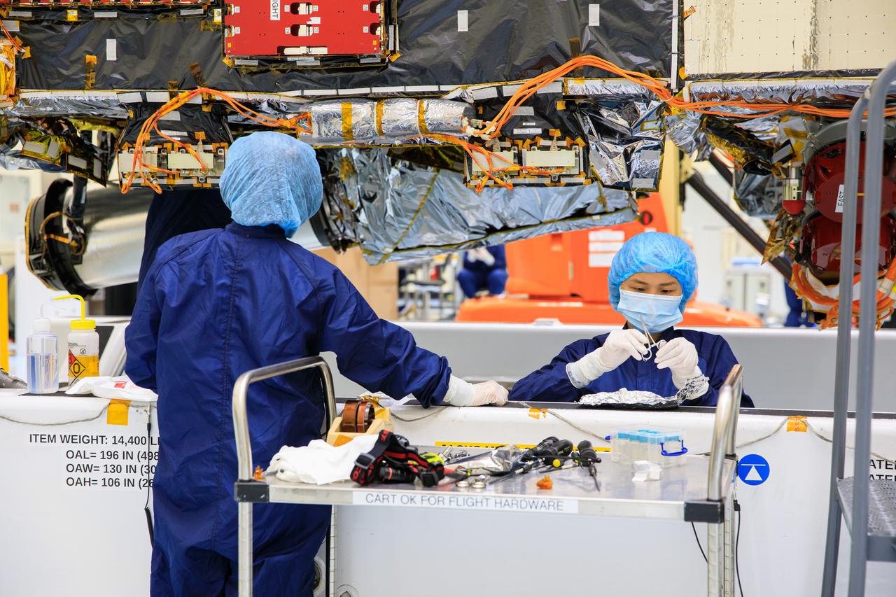Technicians at NASA’s Kennedy Space Center in Florida perform work on the agency’s Psyche spacecraft inside the Payload Hazardous Servicing Facility (PHSF) on May 3, 2022. While inside the PHSF, the spacecraft will undergo routine processing and servicing ahead of launch. Psyche is targeting to lift off aboard a SpaceX Falcon Heavy rocket on Aug. 1, 2022. The spacecraft will use solar-electric propulsion to travel approximately 1.5 billion miles to rendezvous with its namesake asteroid in 2026. The Psyche mission is led by Arizona State University. NASA’s Jet Propulsion Laboratory, which is managed for the agency by Caltech in Pasadena, California, is responsible for the mission’s overall management, system engineering, integration and testing, and mission operations. Maxar Technologies in Palo Alto, California, provided the high-power solar electric propulsion spacecraft chassis. NASA’s Launch Services Program (LSP), based at Kennedy, is managing the launch. Psyche will be the 14th mission in the agency's Discovery program and LSP’s 100th primary mission.