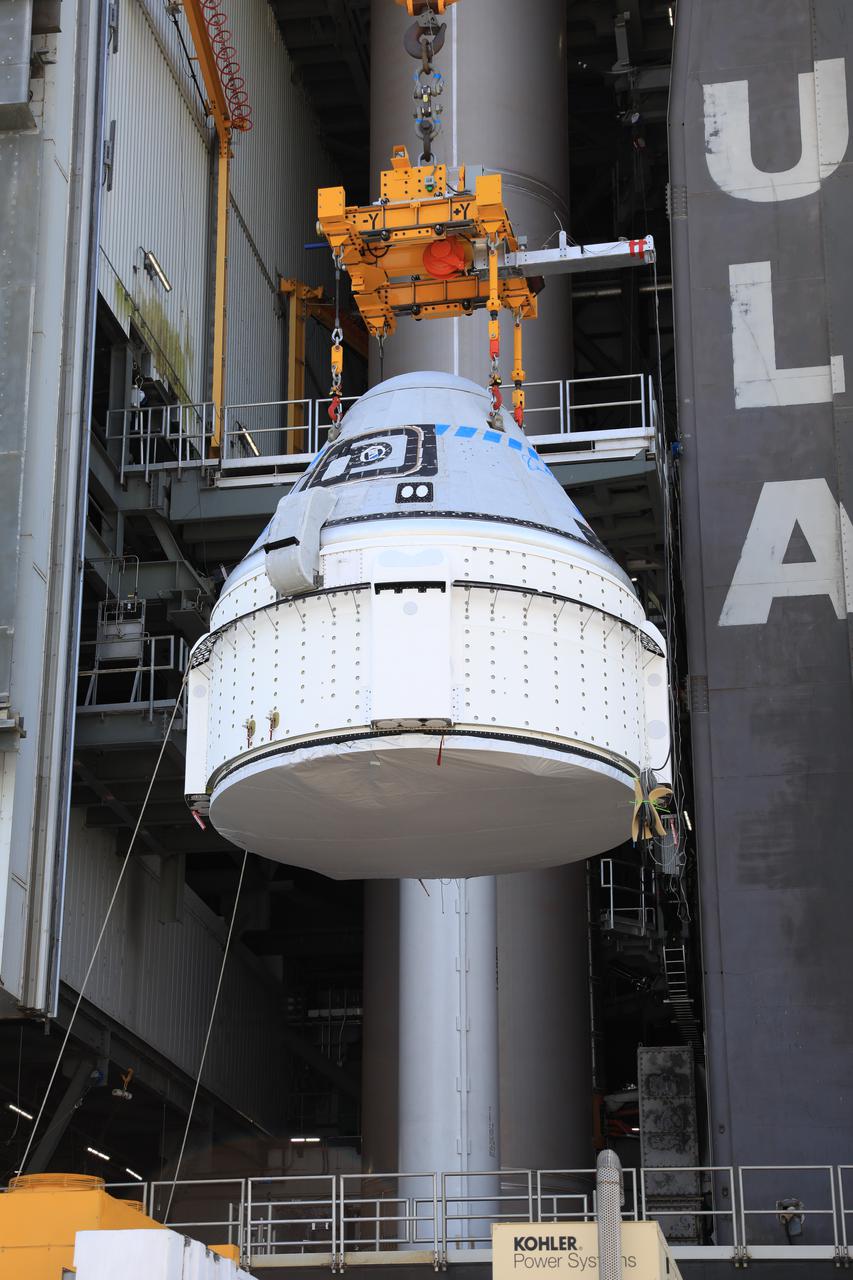 The Boeing CST-100 Starliner spacecraft is lifted at the Vertical Integration Facility at Space Launch Complex-41 at Florida’s Cape Canaveral Space Force Station on May 4, 2022. Starliner will be secured atop a United Launch Alliance Atlas V rocket for Boeing’s second Orbital Flight Test (OFT-2) to the International Space Station for NASA’s Commercial Crew Program. The spacecraft rolled out from Boeing’s Commercial Crew and Cargo Processing Facility at NASA’s Kennedy Space Center earlier in the day.