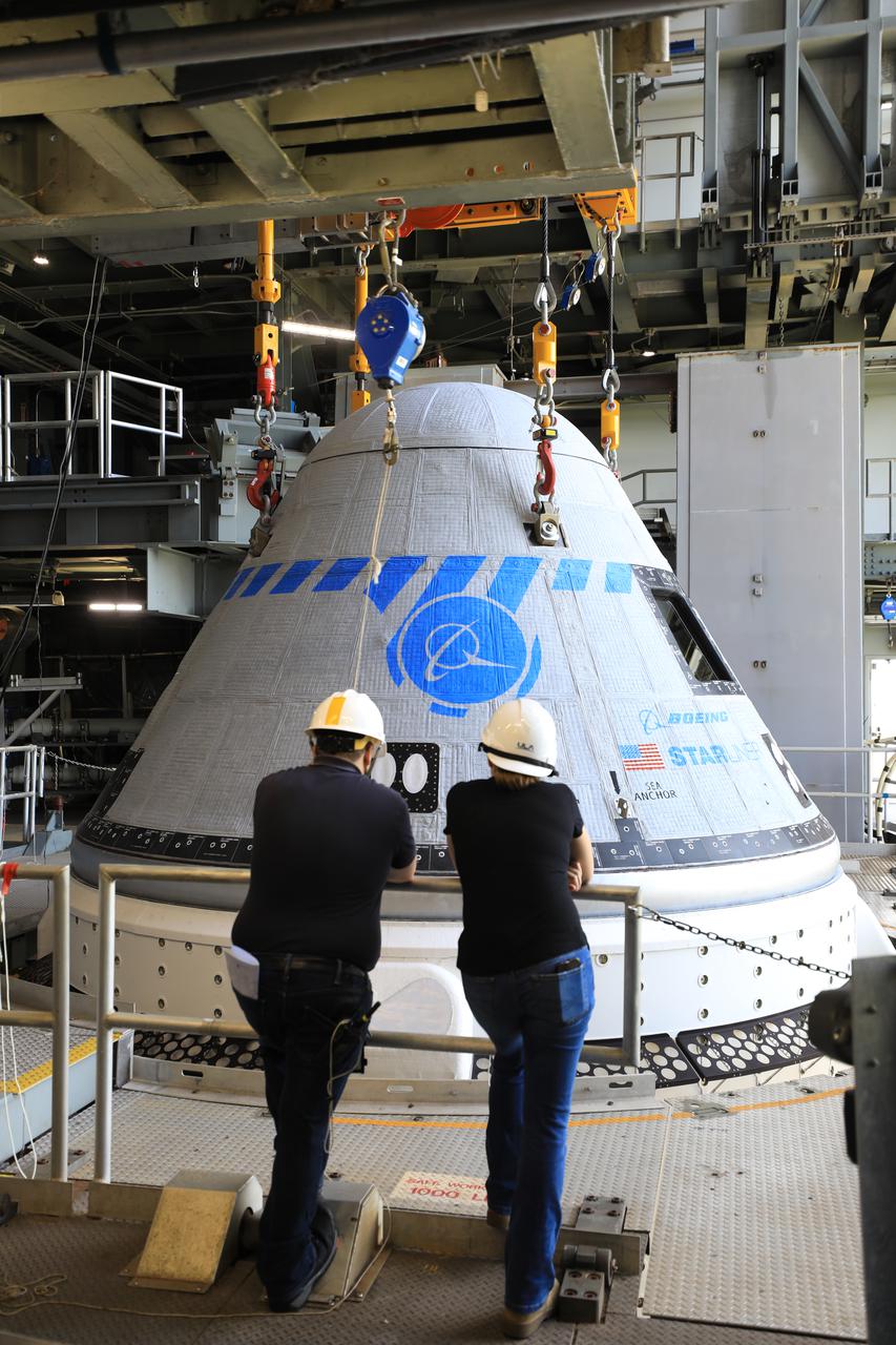 The Boeing CST-100 Starliner spacecraft is lifted at the Vertical Integration Facility at Space Launch Complex-41 at Florida’s Cape Canaveral Space Force Station on May 4, 2022. Starliner will be secured atop a United Launch Alliance Atlas V rocket for Boeing’s second Orbital Flight Test (OFT-2) to the International Space Station for NASA’s Commercial Crew Program. The spacecraft rolled out from Boeing’s Commercial Crew and Cargo Processing Facility at NASA’s Kennedy Space Center earlier in the day.