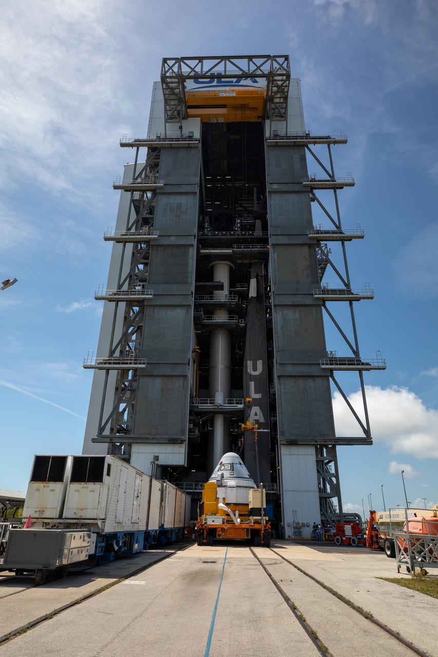 Boeing’s CST-100 Starliner spacecraft arrives at the Vertical Integration Facility at Space Launch Complex-41 at Cape Canaveral Space Force Station in Florida on May 4, 2022. Starliner will be secured atop a United Launch Alliance Atlas V rocket for Boeing’s second Orbital Flight Test (OFT-2) to the International Space Station for NASA’s Commercial Crew Program. The spacecraft rolled out from Boeing’s Commercial Crew and Cargo Processing Facility at NASA’s Kennedy Space Center earlier in the day.