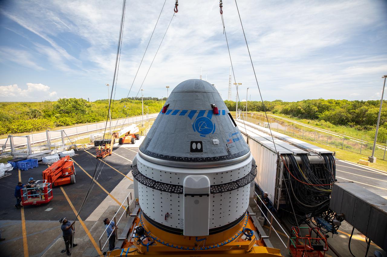 Boeing’s CST-100 Starliner spacecraft rolls out from the company’s Commercial Crew and Cargo Processing Facility at NASA’s Kennedy Space Center in Florida on May 4, 2022. The spacecraft will make the trip to the Vertical Integration Facility at Space Launch Complex-41 at Cape Canaveral Space Force Station where it will be secured atop a United Launch Alliance Atlas V rocket for Boeing’s second Orbital Flight Test (OFT-2) to the International Space Station for NASA’s Commercial Crew Program.