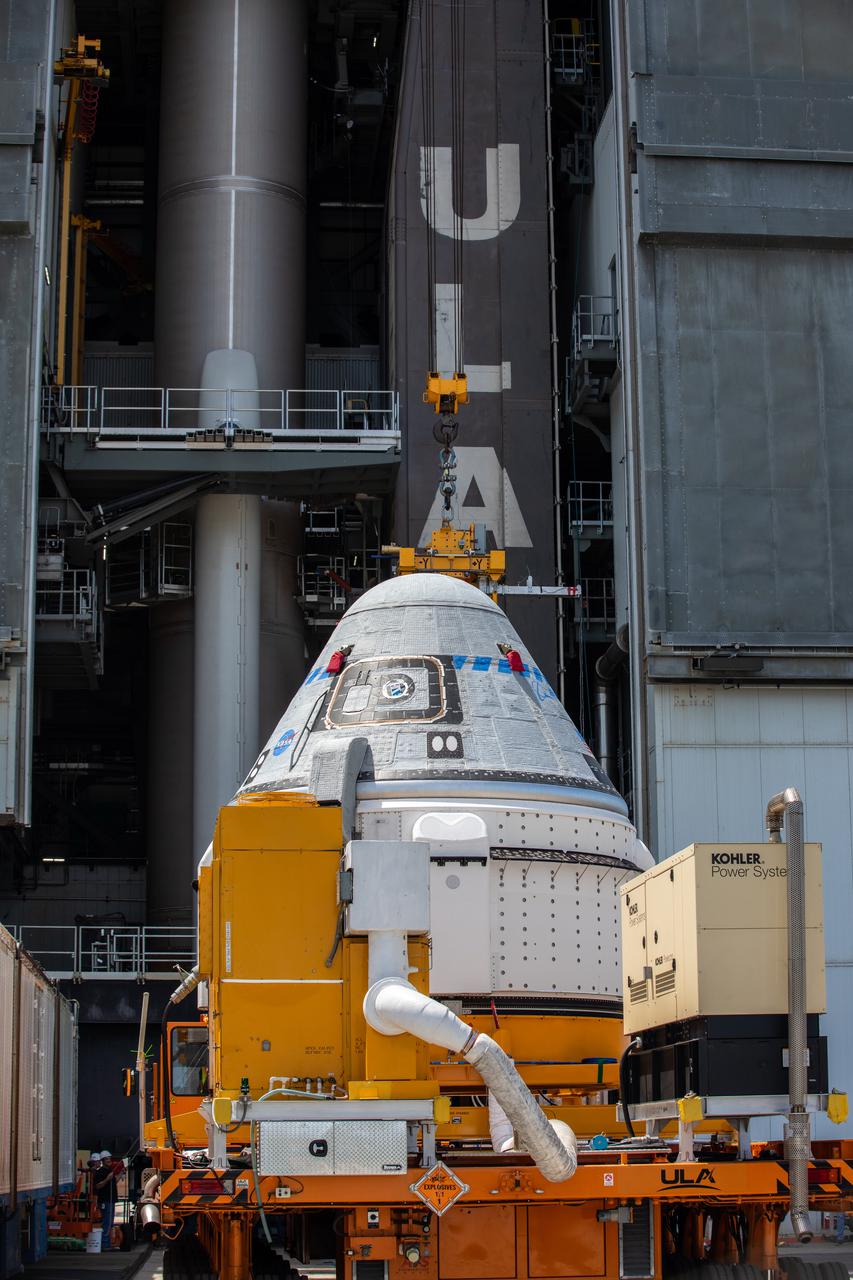 Boeing’s CST-100 Starliner spacecraft arrives at the Vertical Integration Facility at Space Launch Complex-41 at Cape Canaveral Space Force Station in Florida on May 4, 2022. Starliner will be secured atop a United Launch Alliance Atlas V rocket for Boeing’s second Orbital Flight Test (OFT-2) to the International Space Station for NASA’s Commercial Crew Program. The spacecraft rolled out from Boeing’s Commercial Crew and Cargo Processing Facility at NASA’s Kennedy Space Center earlier in the day.