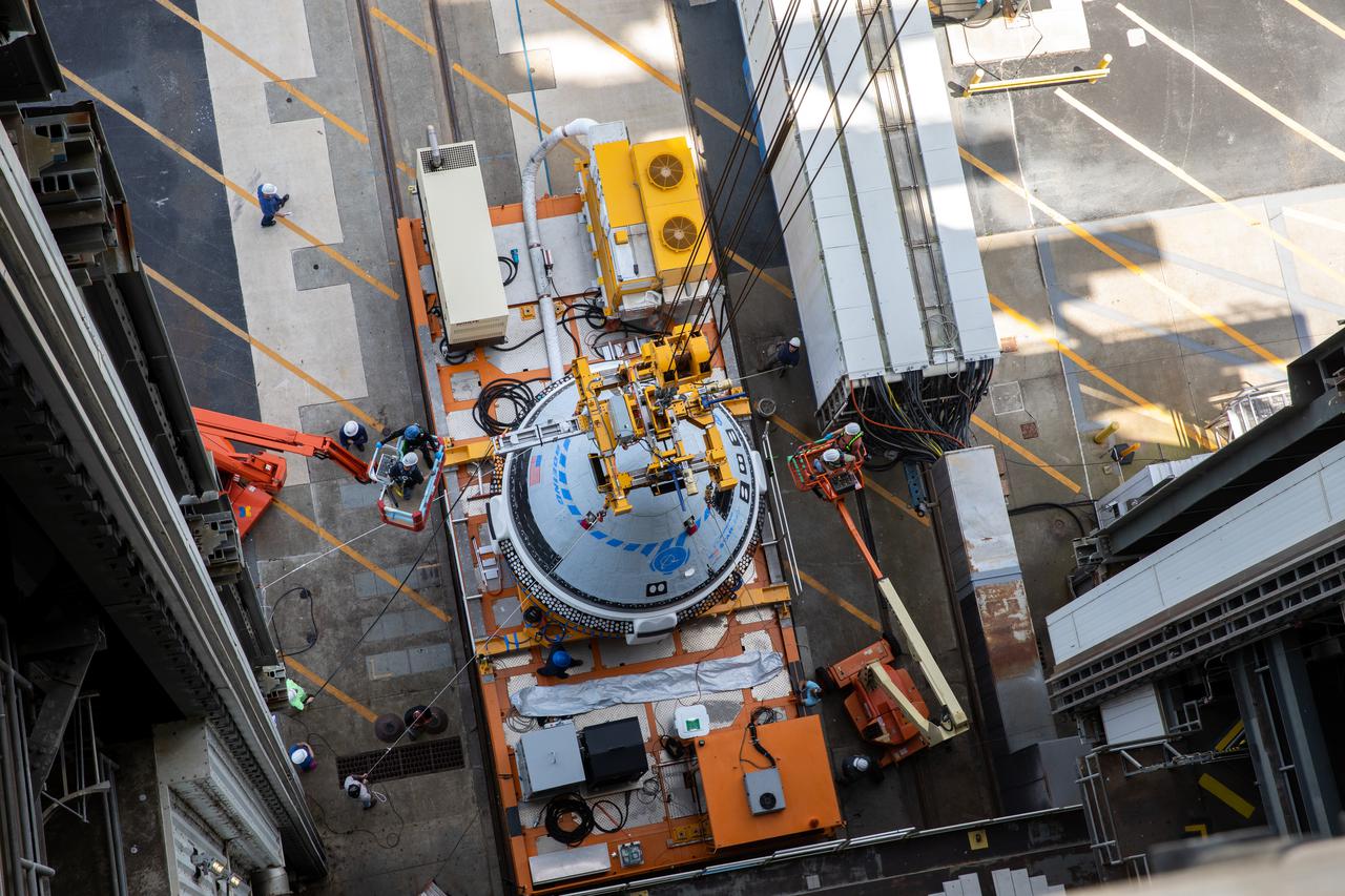 The Boeing CST-100 Starliner spacecraft is lifted at the Vertical Integration Facility at Space Launch Complex-41 at Florida’s Cape Canaveral Space Force Station on May 4, 2022. Starliner will be secured atop a United Launch Alliance Atlas V rocket for Boeing’s second Orbital Flight Test (OFT-2) to the International Space Station for NASA’s Commercial Crew Program. The spacecraft rolled out from Boeing’s Commercial Crew and Cargo Processing Facility at NASA’s Kennedy Space Center earlier in the day.