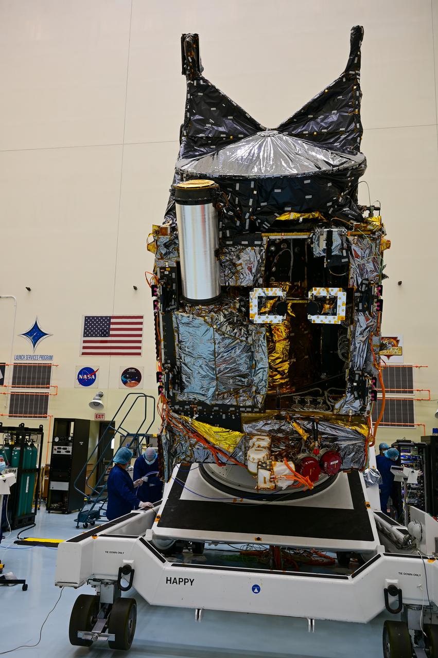 A team working on NASA’s Psyche spacecraft transitioning it from a vertical to horizontal test configuration during prelaunch processing inside the Payload Hazardous Servicing Facility at NASA’s Kennedy Space Center in Florida on May 9, 2022. The mission is targeting an Aug. 1 launch atop a SpaceX Falcon Heavy rocket from Launch Complex 39A at Kennedy. The spacecraft will use solar-electric propulsion to travel approximately 1.5 billion miles to rendezvous with its namesake asteroid in 2026. The Psyche mission is led by Arizona State University. NASA’s Jet Propulsion Laboratory, which is managed for the agency by Caltech in Pasadena, California, is responsible for the mission’s overall management, system engineering, integration and testing, and mission operations. Maxar Technologies in Palo Alto, California, provided the high-power solar electric propulsion spacecraft chassis. NASA’s Launch Services Program (LSP), based at Kennedy, is managing the launch.