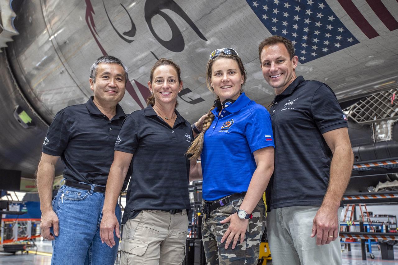 The crew members who will fly on NASA’s SpaceX Crew-5 mission to the International Space Station pause for a photograph during a visit to the agency’s Kennedy Space Center in Florida on May 10, 2022. From left are JAXA (Japan Aerospace Exploration Agency) astronaut Koichi Wakata, mission specialist; NASA astronaut Nicole Mann, mission commander; Roscosmos cosmonaut Anna Kikina, mission specialist; and NASA astronaut Josh Cassada, pilot. SpaceX’s Falcon 9 rocket and Crew Dragon spacecraft are scheduled to lift off from Kennedy’s Launch Complex 39A on Oct. 3, 2022. This will be the fifth crew rotation mission of SpaceX’s human transportation system and its sixth flight with astronauts to the space station for NASA’s Commercial Crew Program.