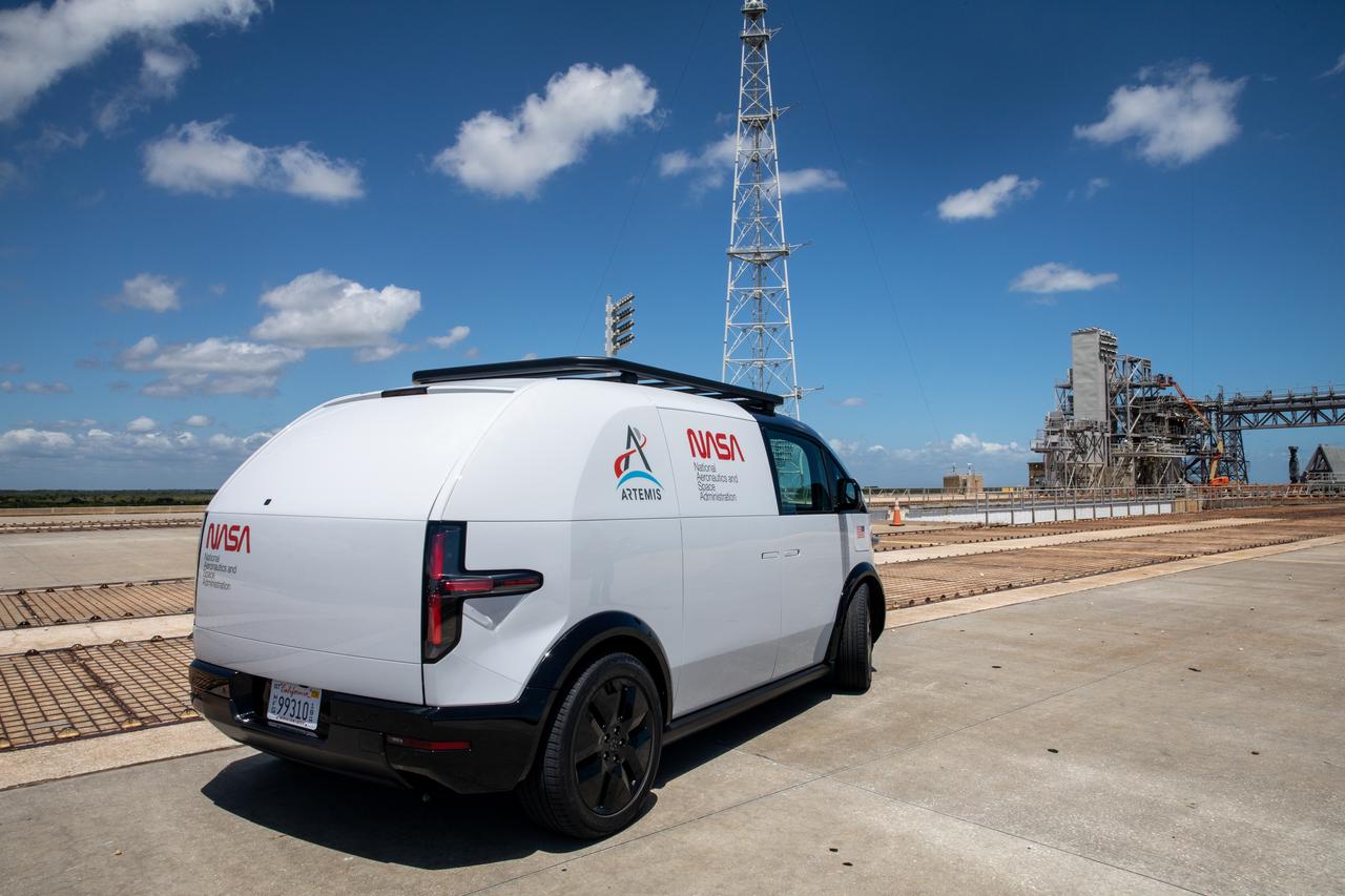 Prototypes of the crew transportation vehicle (CTV) for Artemis crewed missions are driven out to Launch Complex 39B at NASA’s Kennedy Space Center in Florida on May 11, 2022. Canoo Technologies Inc., was awarded a contract to design and provide the next generation of CTVs for the Artemis crewed missions. Representatives with Canoo were at the spaceport demonstrating the environmentally friendly fleet of vehicles. Artemis II will be the first Artemis mission flying crew aboard Orion. In later missions, NASA will land the first woman and the first person of color on the surface of the Moon, paving the way for a long-term lunar presence and serving as a steppingstone on the way to Mars. 